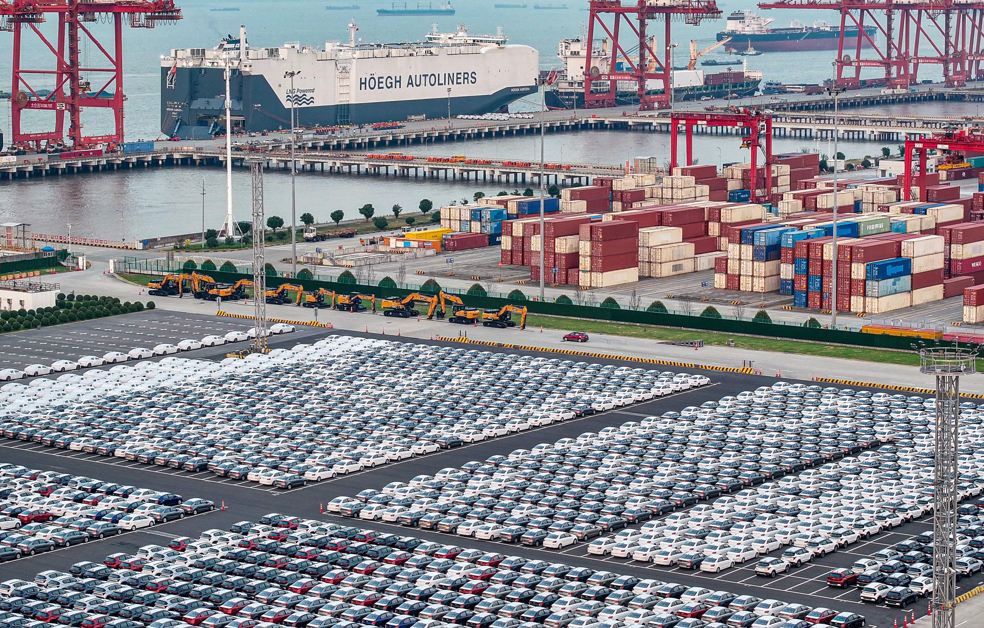 Cars at a port in eastern China before they are loaded for export. Photo: AFP