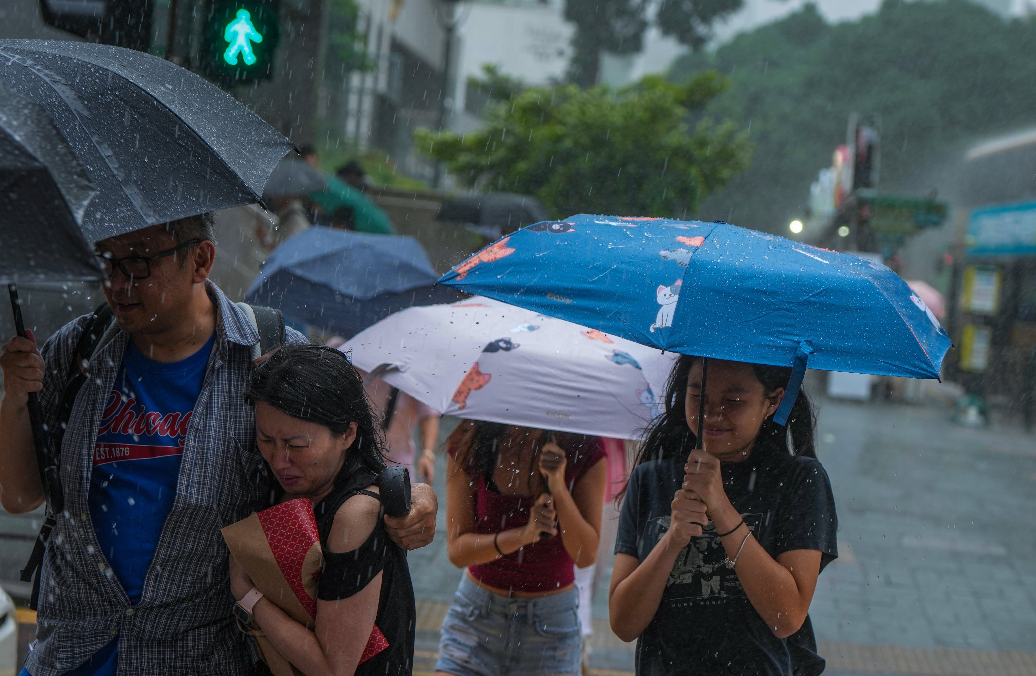 Heavy showers are expected as the Observatory issues an amber rainstorm alert. Photo: Sam Tsang