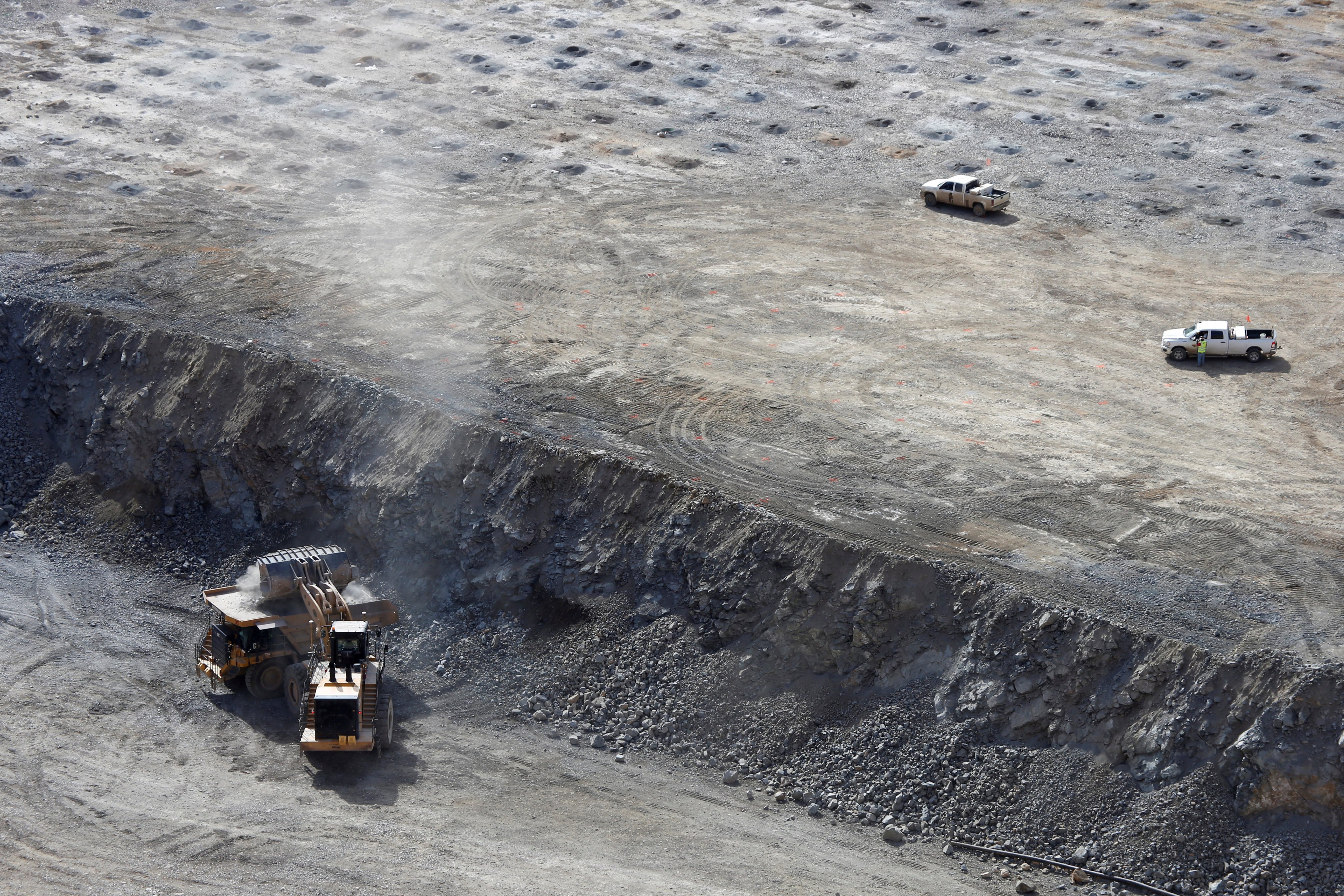 A wheel-loader operator fills a truck with ore at the MP Materials rare earth mine in Mountain Pass, California. Photo: Reuters