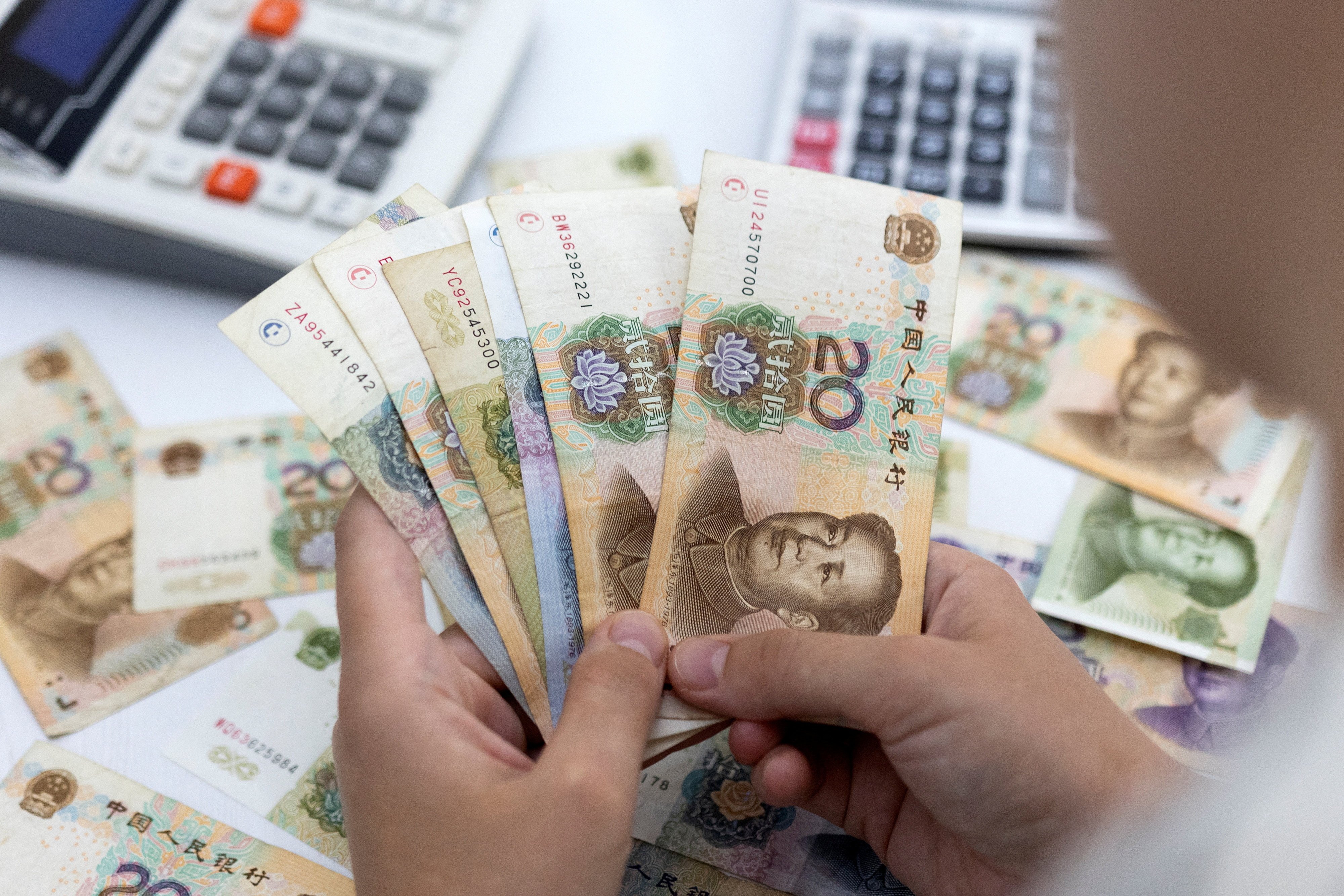 After the US Federal Reserve’s interest rate cuts and a set of monetary policy measures China announced to stimulate its economy, the value of the yuan has rapidly increased. Photo: Reuters