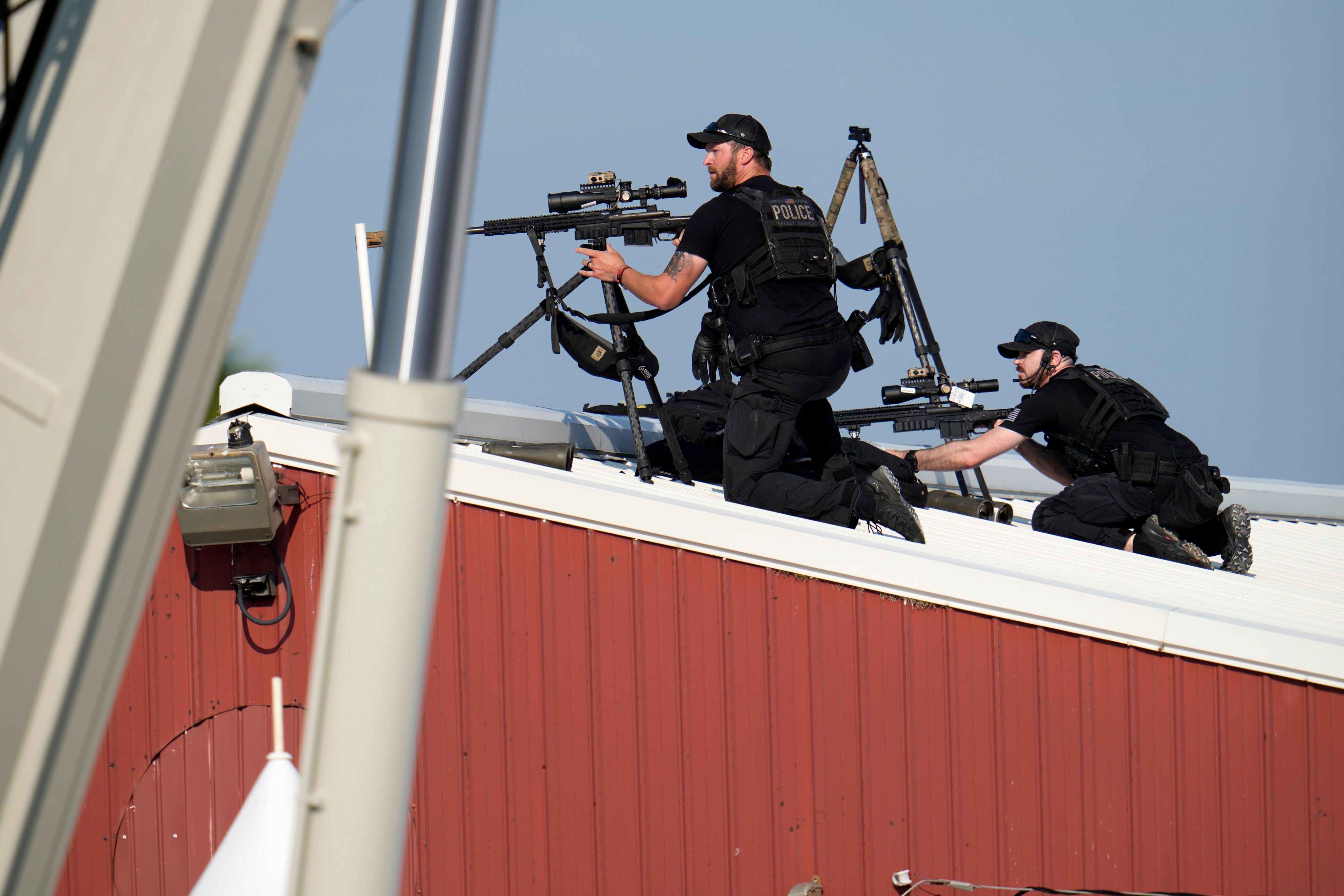 Police snipers return fire after shots were fired when Donald Trump spoke at a campaign event in Butler. Photo: AP