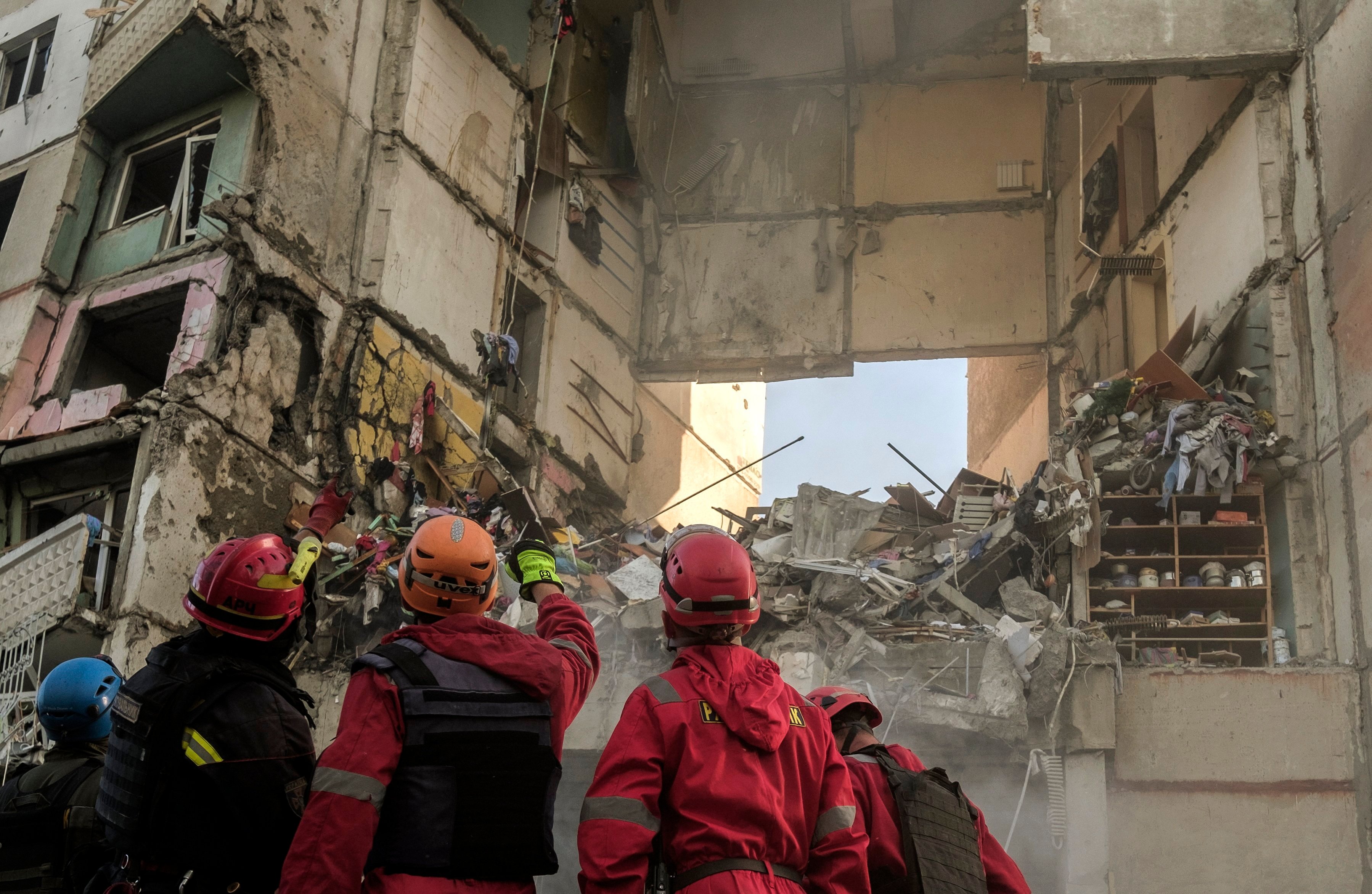 Rescuers work at the site of a high-rise residential building shelled by Russia in the Ukrainian city of Kharkiv on Tuesday. Photo: EPA-EFE