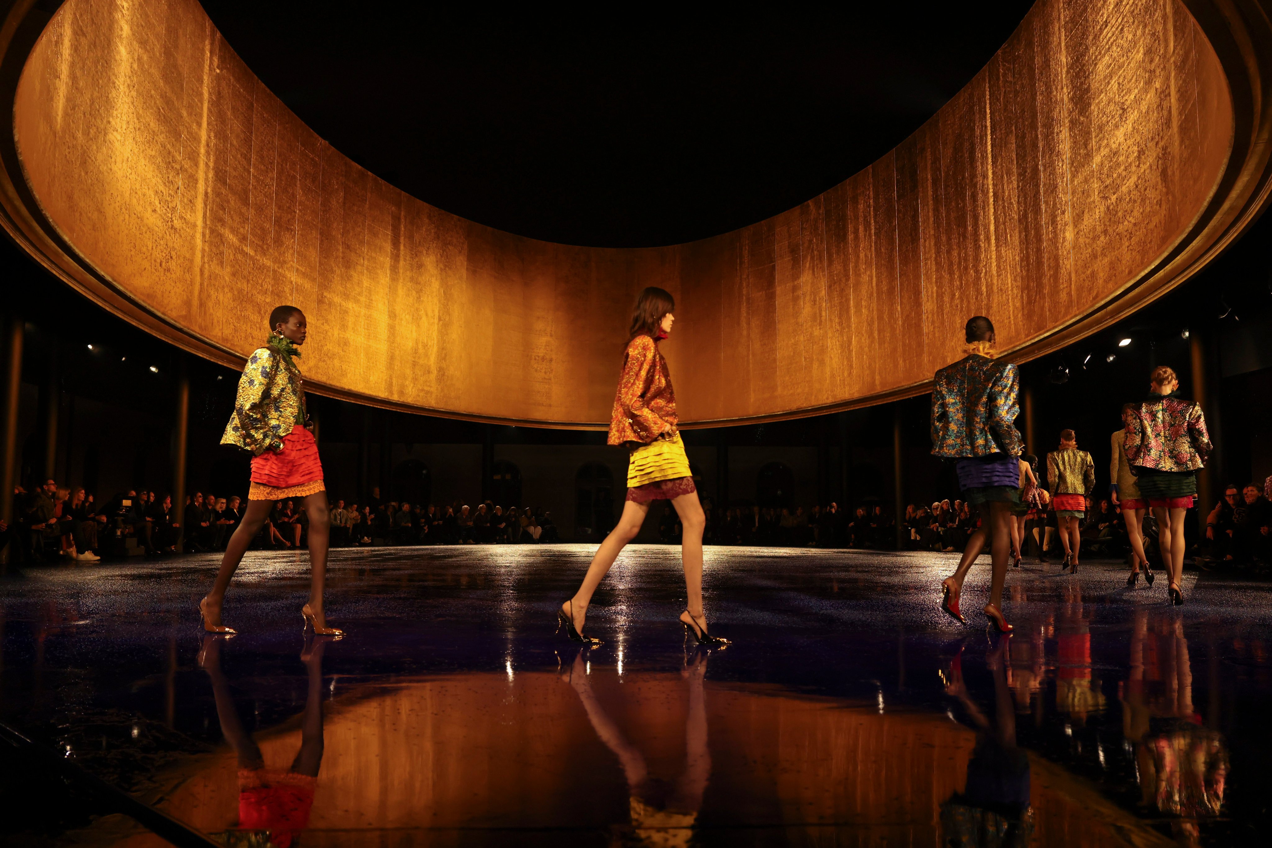 Rain couldn’t dampen the glamour of the Saint Laurent spring/summer 2025 show during Paris Fashion Week. Photo: AP