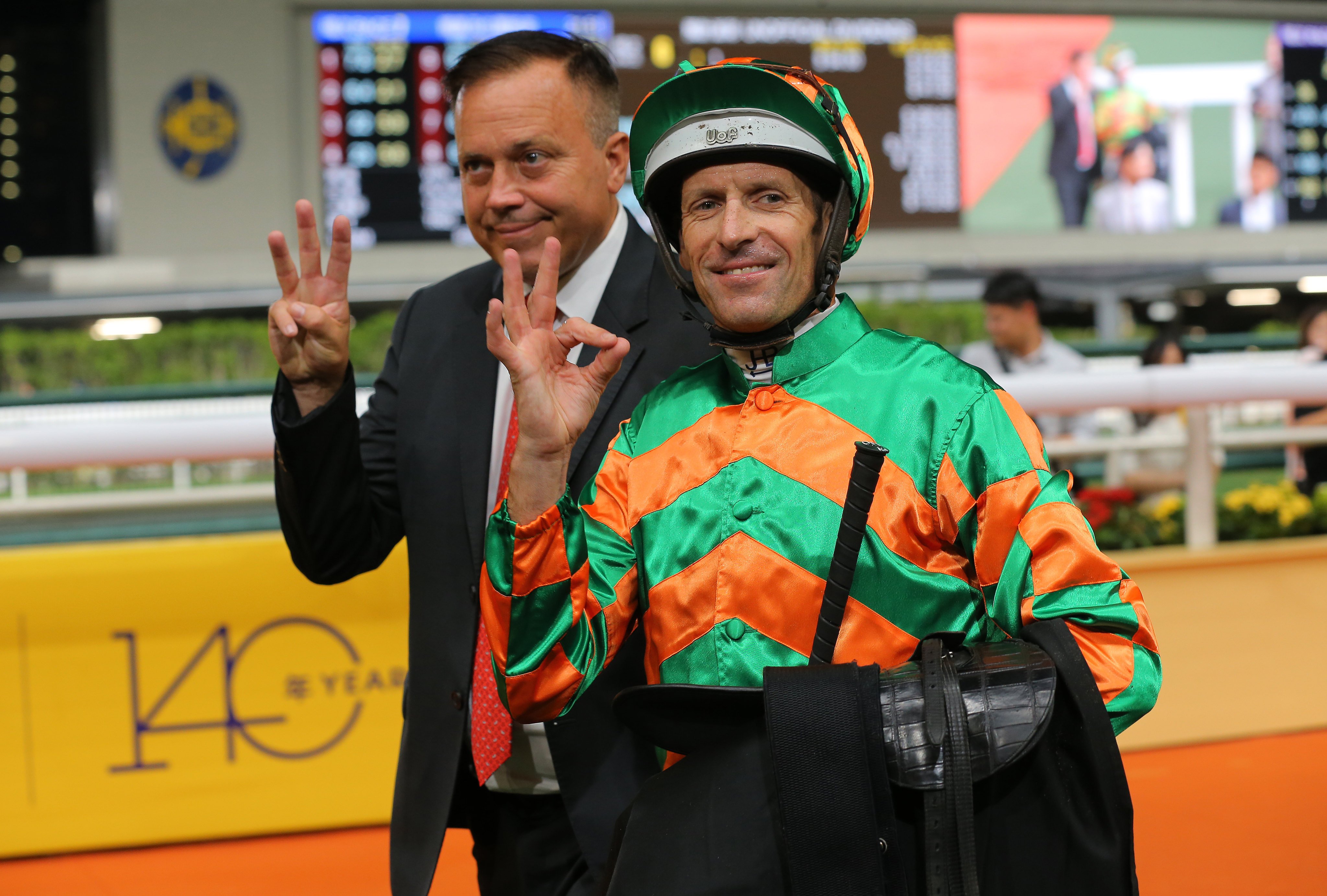 Caspar Fownes and Hugh Bowman celebrate a third of the evening. Photos: Kenneth Chan