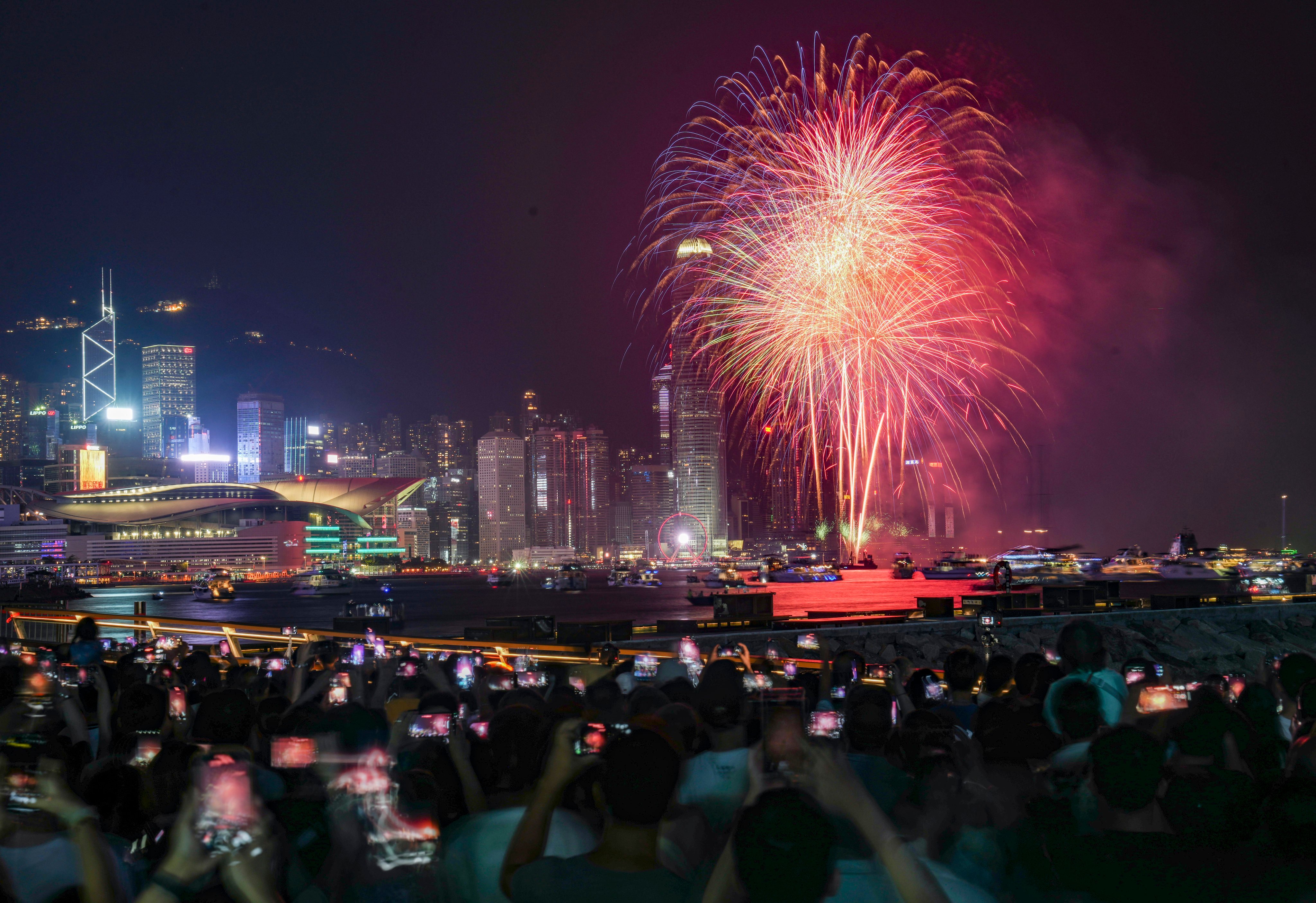 People watch a National Day fireworks display last year in  Hong Kong’s North Point district. The highlight of this year’s celebrations will be a 23-minute fireworks show celebrating China’s achievements. Photo: Sam Tsang