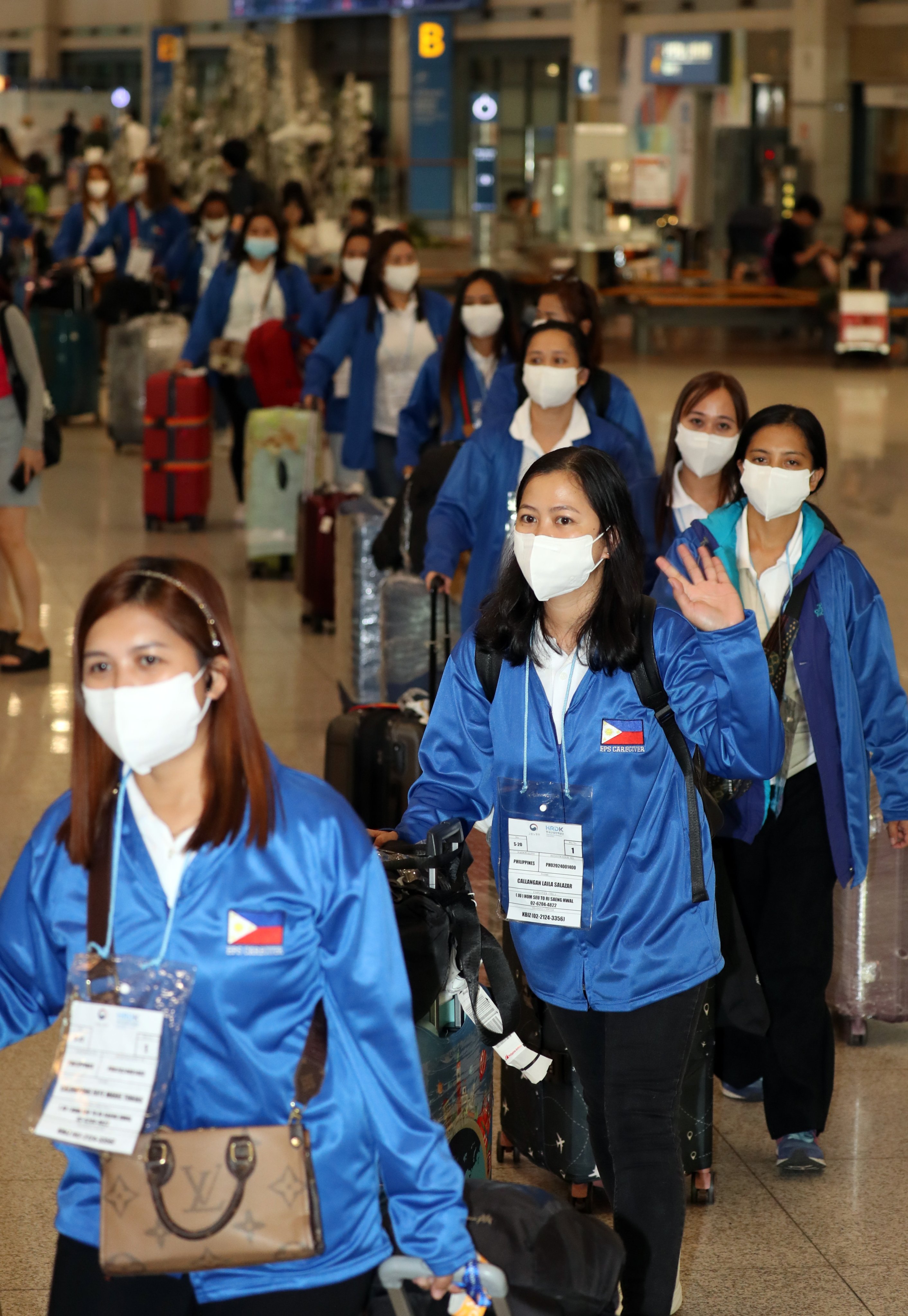 Filipino women participating in a pilot nanny programme arrive at Incheon airport in South Korea on August 6. Photo: EPA-EFE/Yonhap