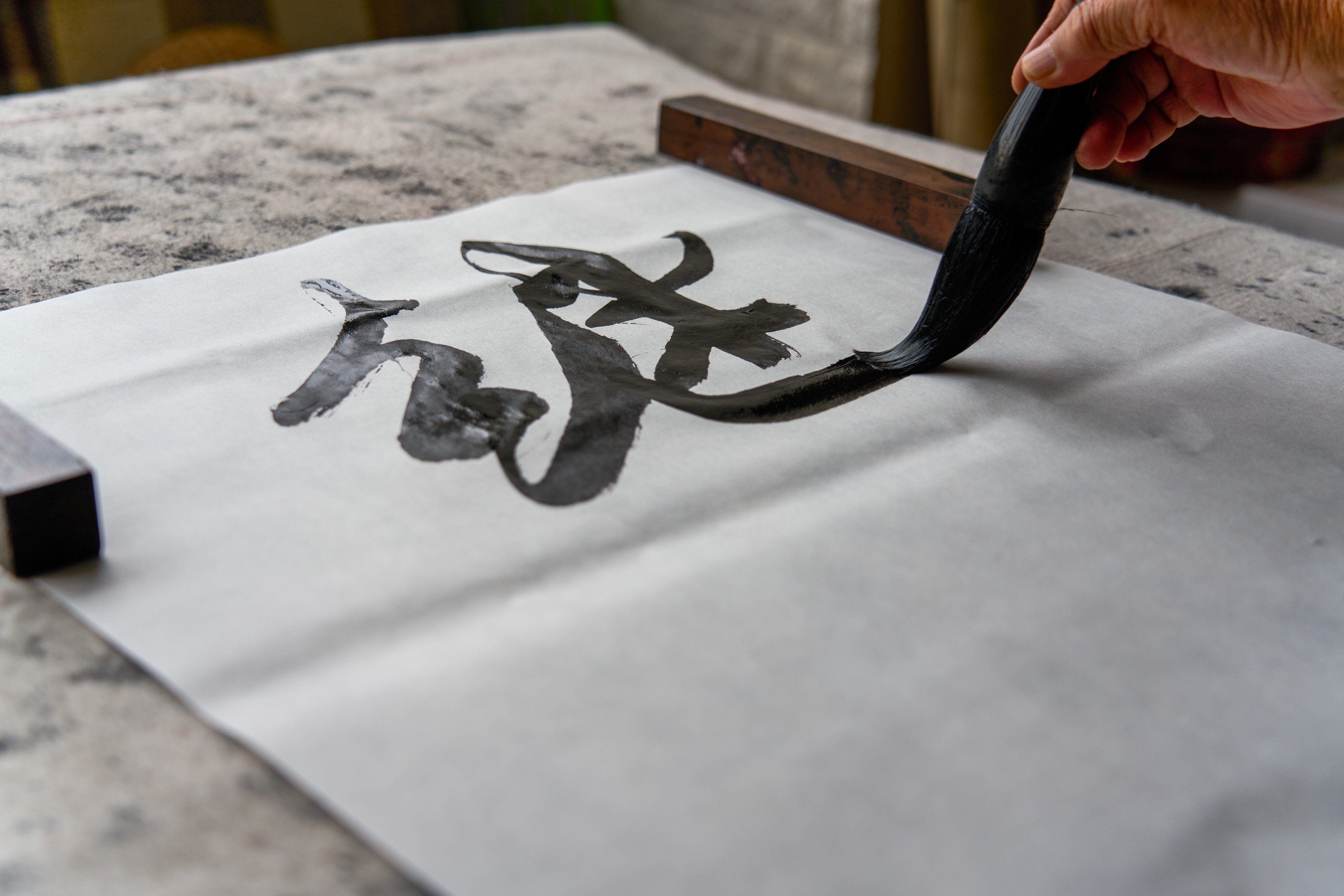 Discover the fascinating history of Chinese characters, from their origins in oracle bone script to their modern simplification. Photo: Shutterstock 