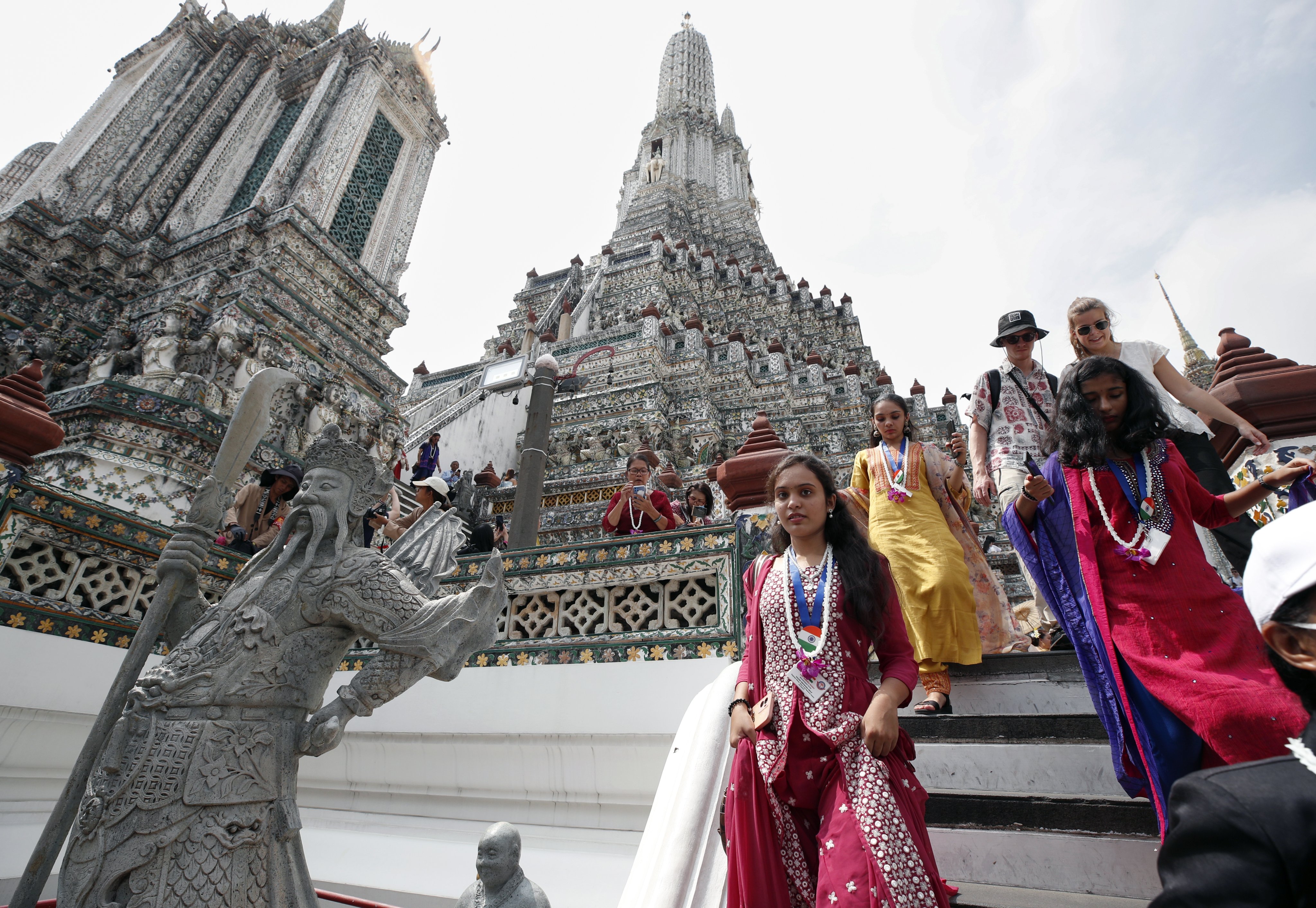 Tourists from India visit Wat Arun or the Temple of Dawn in Bangkok, Thailand, on November 2, 2023. The Thai cabinet approved a visa exemption for Indian tourists for a 30-day stay as part of the government’s policy to boost the tourism industry. Photo: EPA-EFE