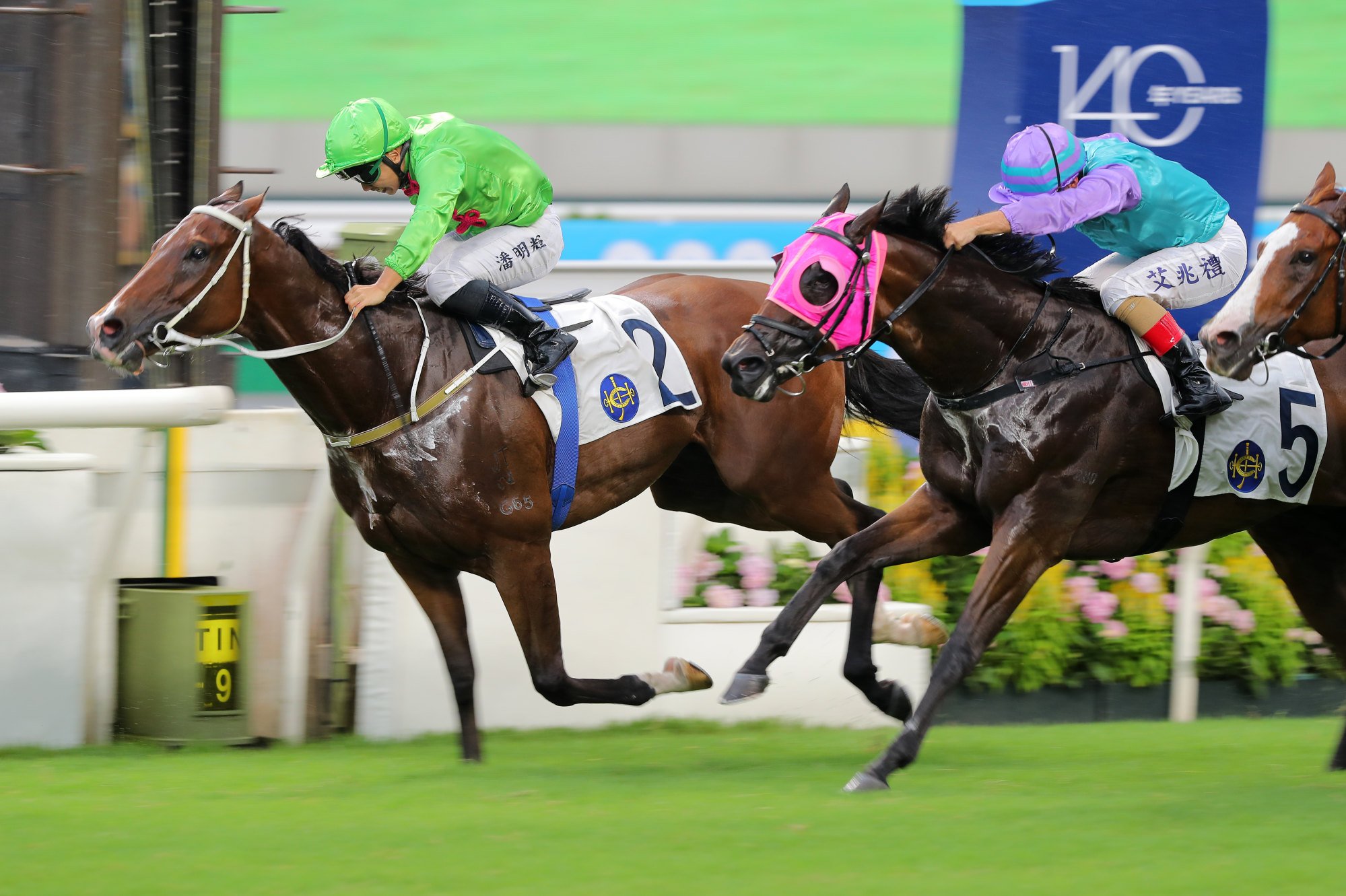 Harold Win (right) finds Super Fortune too strong at Sha Tin earlier this month.