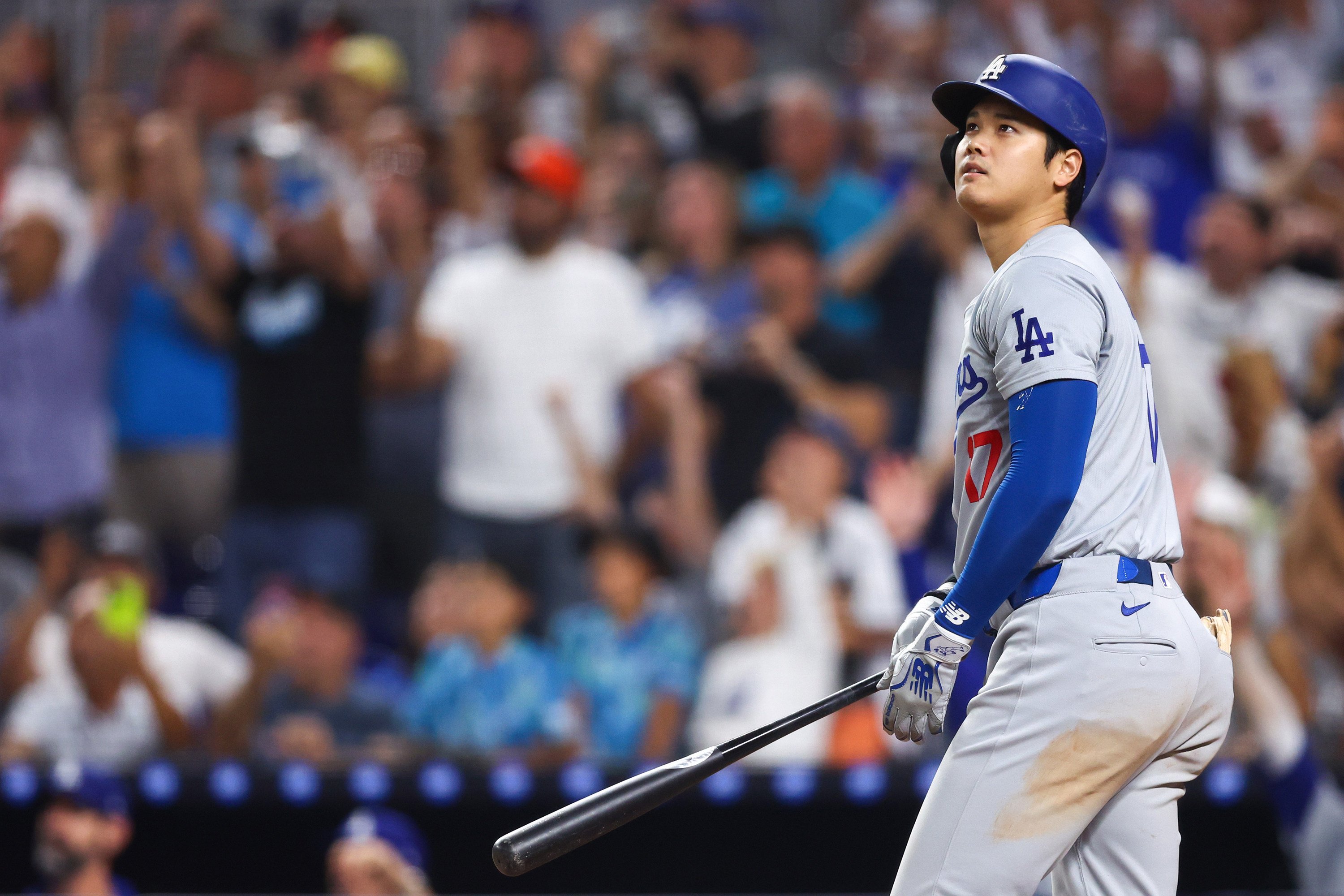 Shohei Ohtani of the Los Angeles Dodgers hits a two-run home run against the Miami Marlins on September 19, his 50th of the season, to become the first player with a 50/50 season in MLB history. Photo: TNS