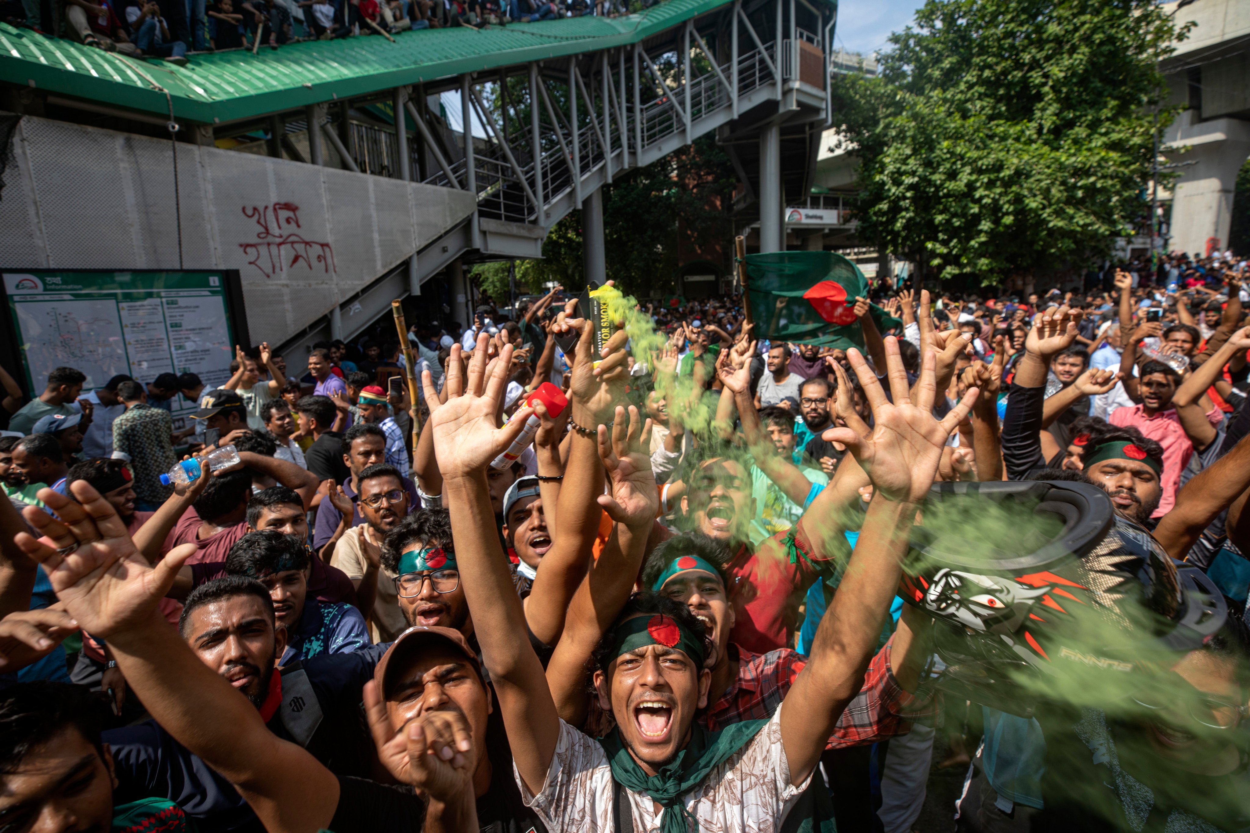 Protesters in Dhaka, Bangladesh, shout slogans as they celebrate Prime Minister Sheikh Hasina’s resignation on August 5. Photo: AP