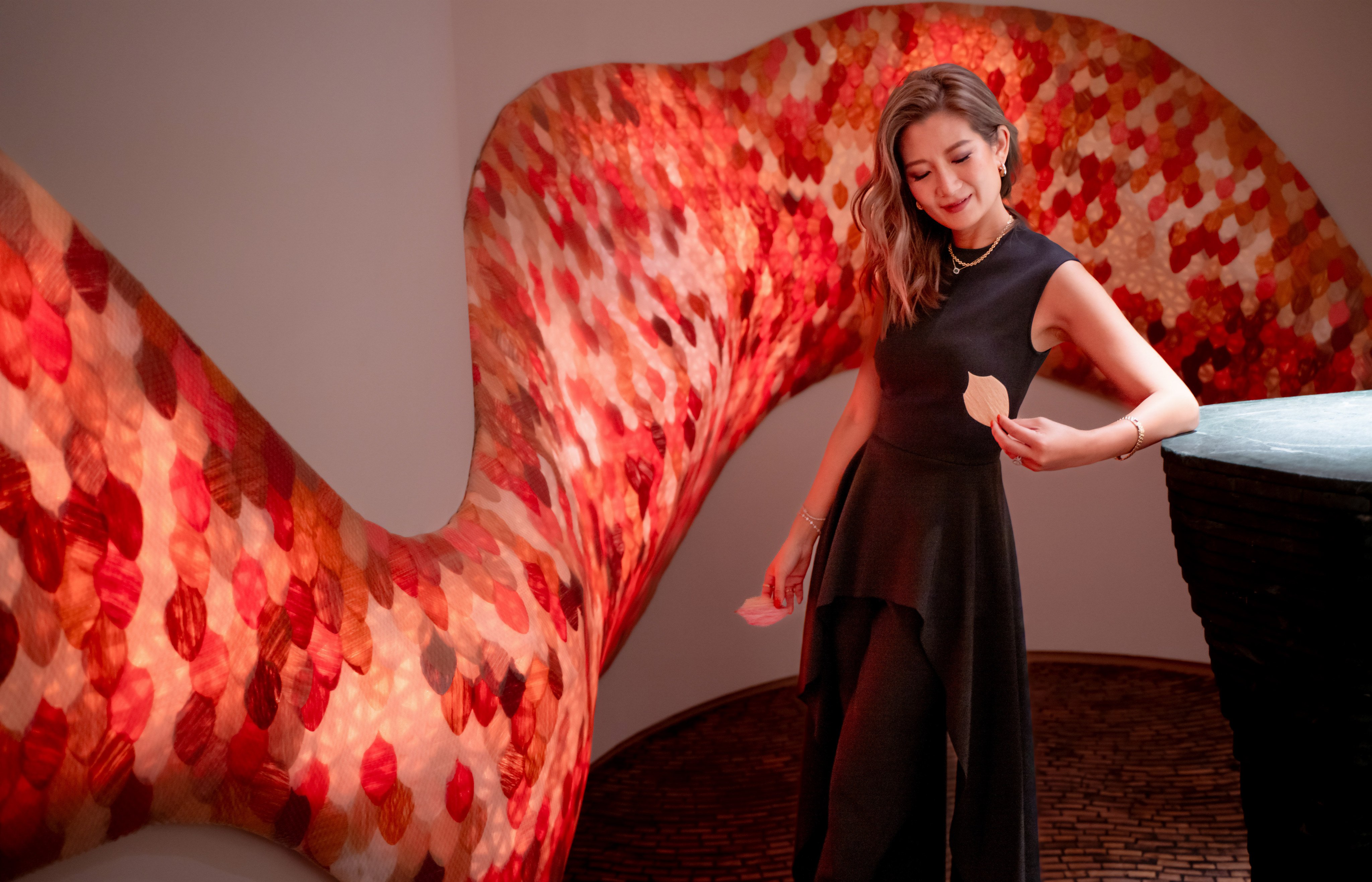 Elaine Ng and her whisky-inspired installation, Phantasmagoria. Photo: Alexander Mak