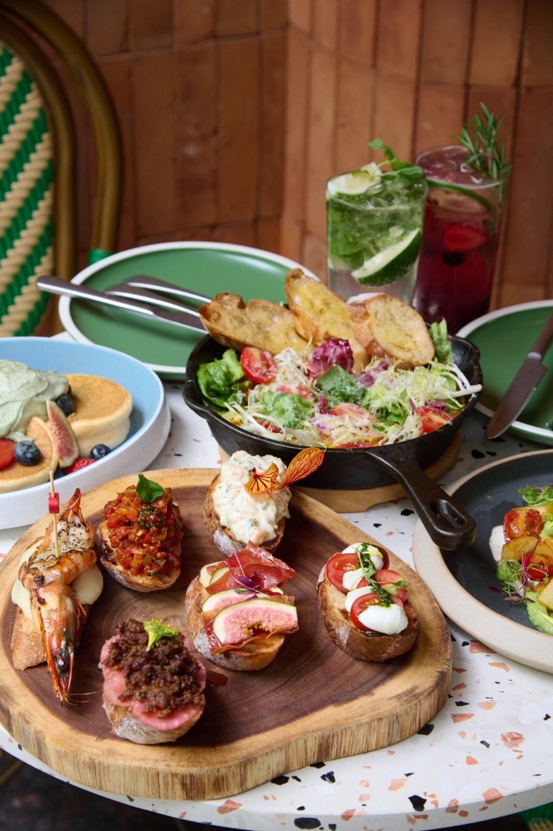 Popular options at Maybe Tapas include its signature mixed platter, Mediterranean salad, fruity soufflé and a selection of cocktails. Photo: Xiaohongshu