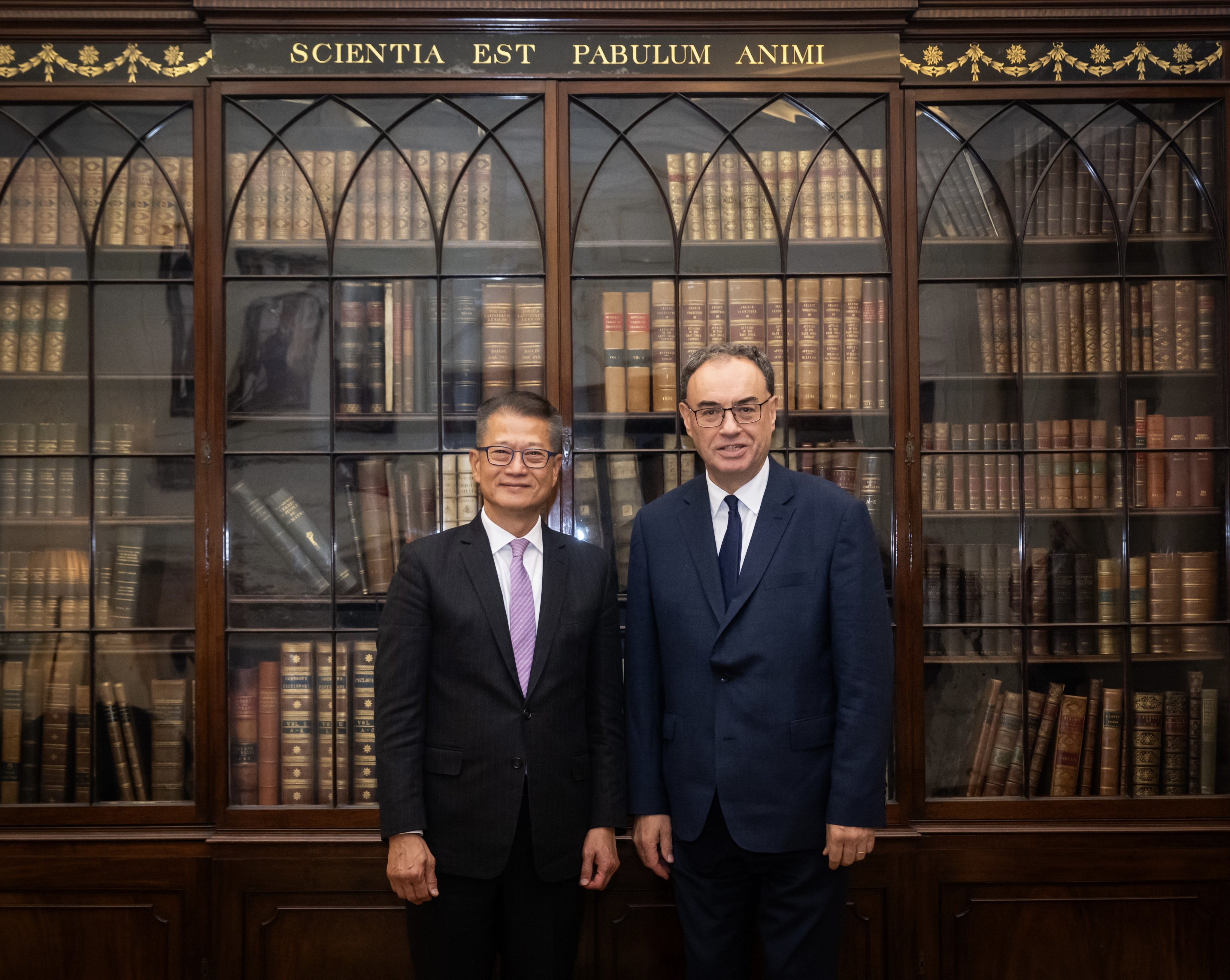 Finance chief Paul Chan (left) meets Bank of England governor Andrew Bailey to discuss the global economy and financial development. Photo: SCMP