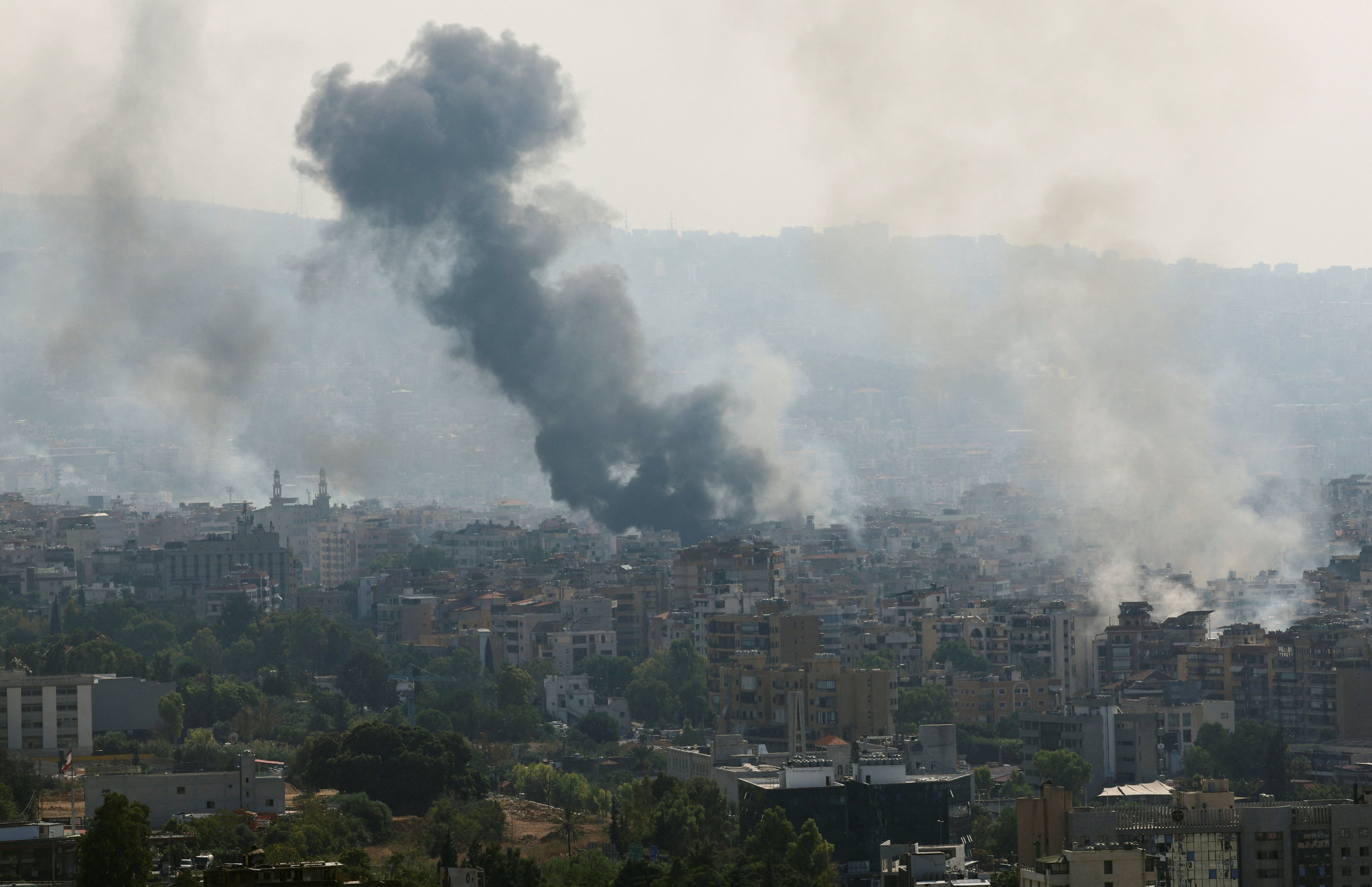 Smoke billows over Beirut’s southern suburbs, amid ongoing hostilities between Hezbollah and Israeli forces. Photo: Reuters