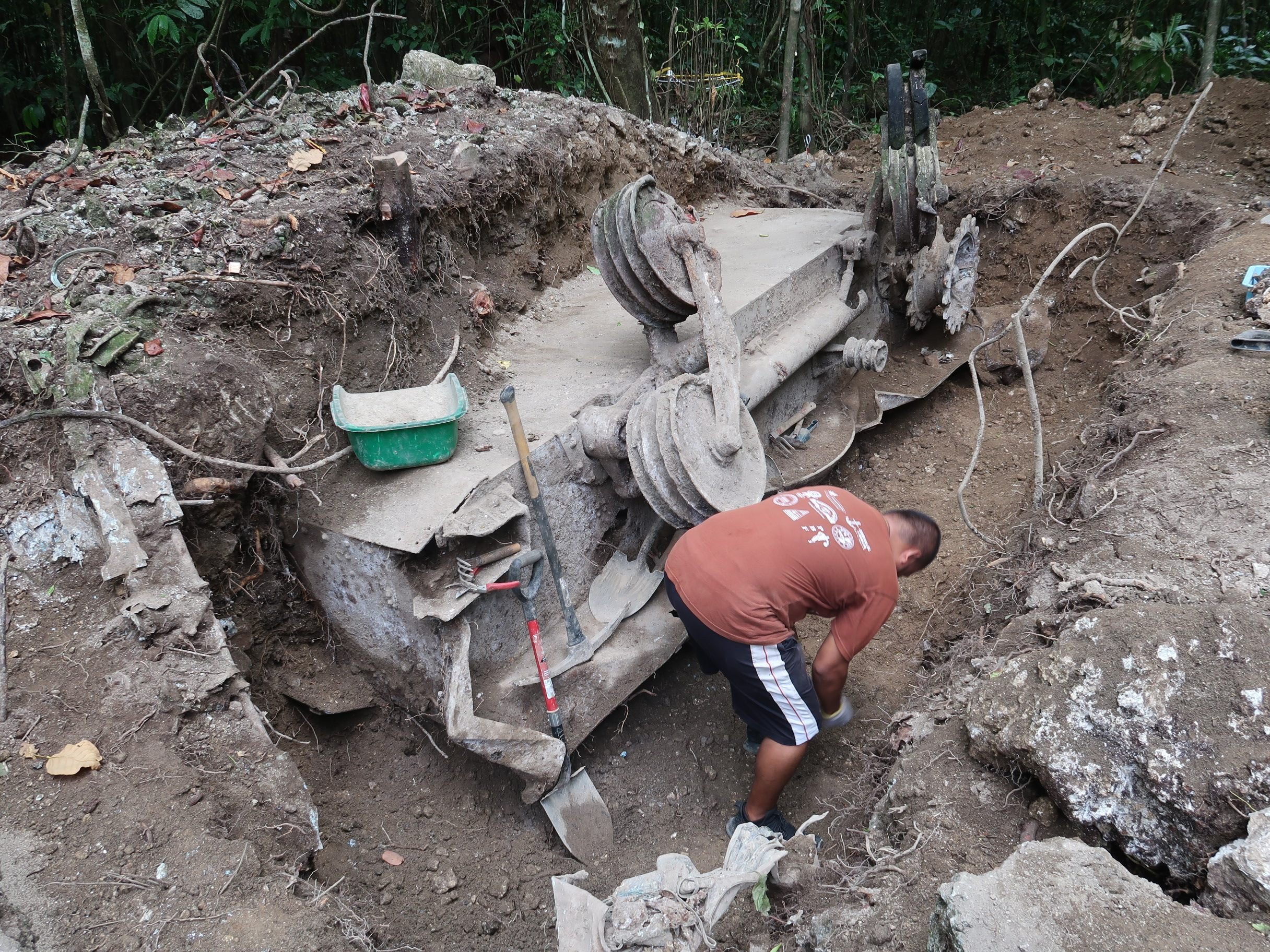 Excavation progresses on a Japanese Type 95 light tank that was knocked out by US Marines in 1944. Photo: Julian Ryall