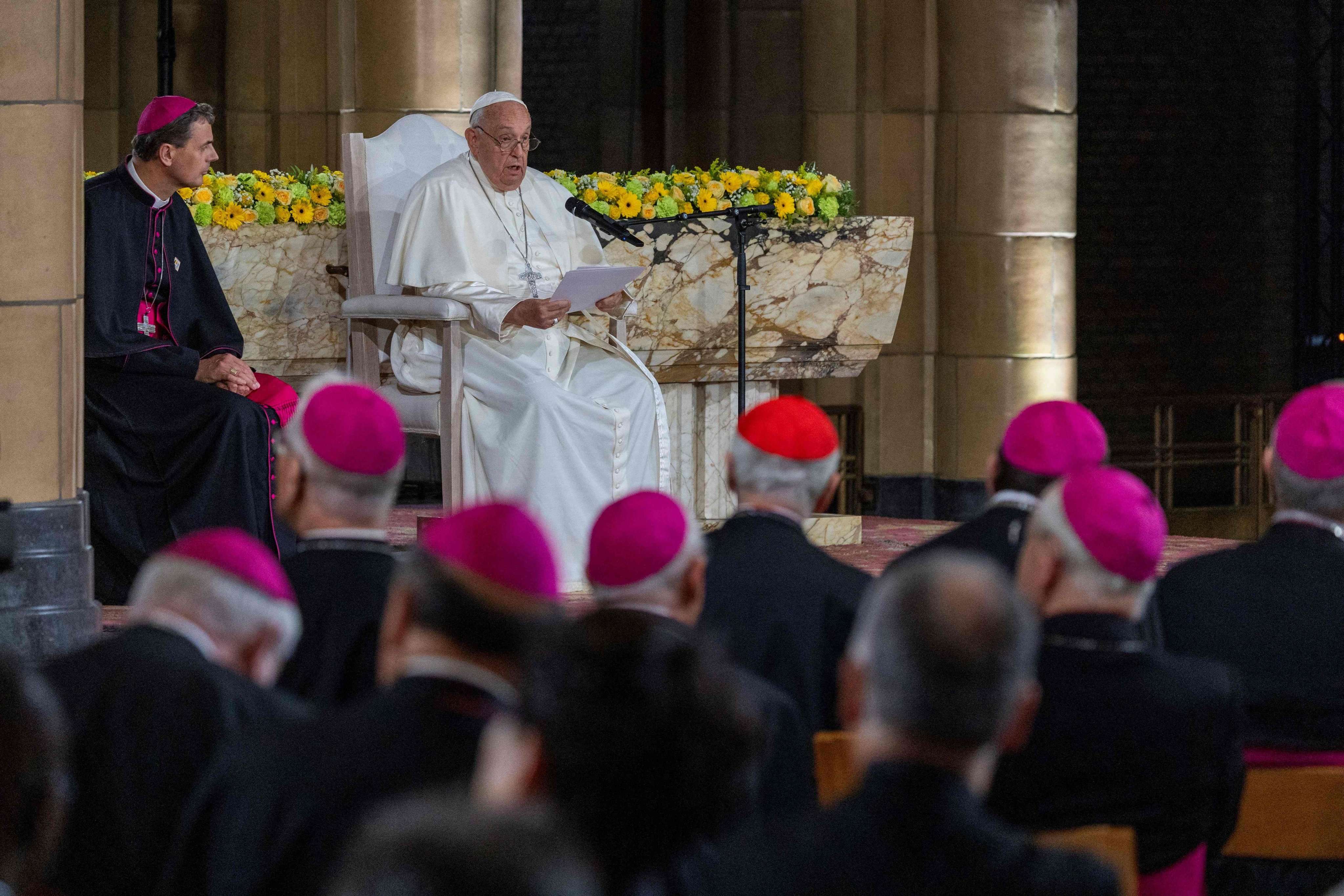 Pope Francis speaks as he meets with clergy at the Koekelberg Basilica of the Sacred Heart in Brussels. Photo: AFP