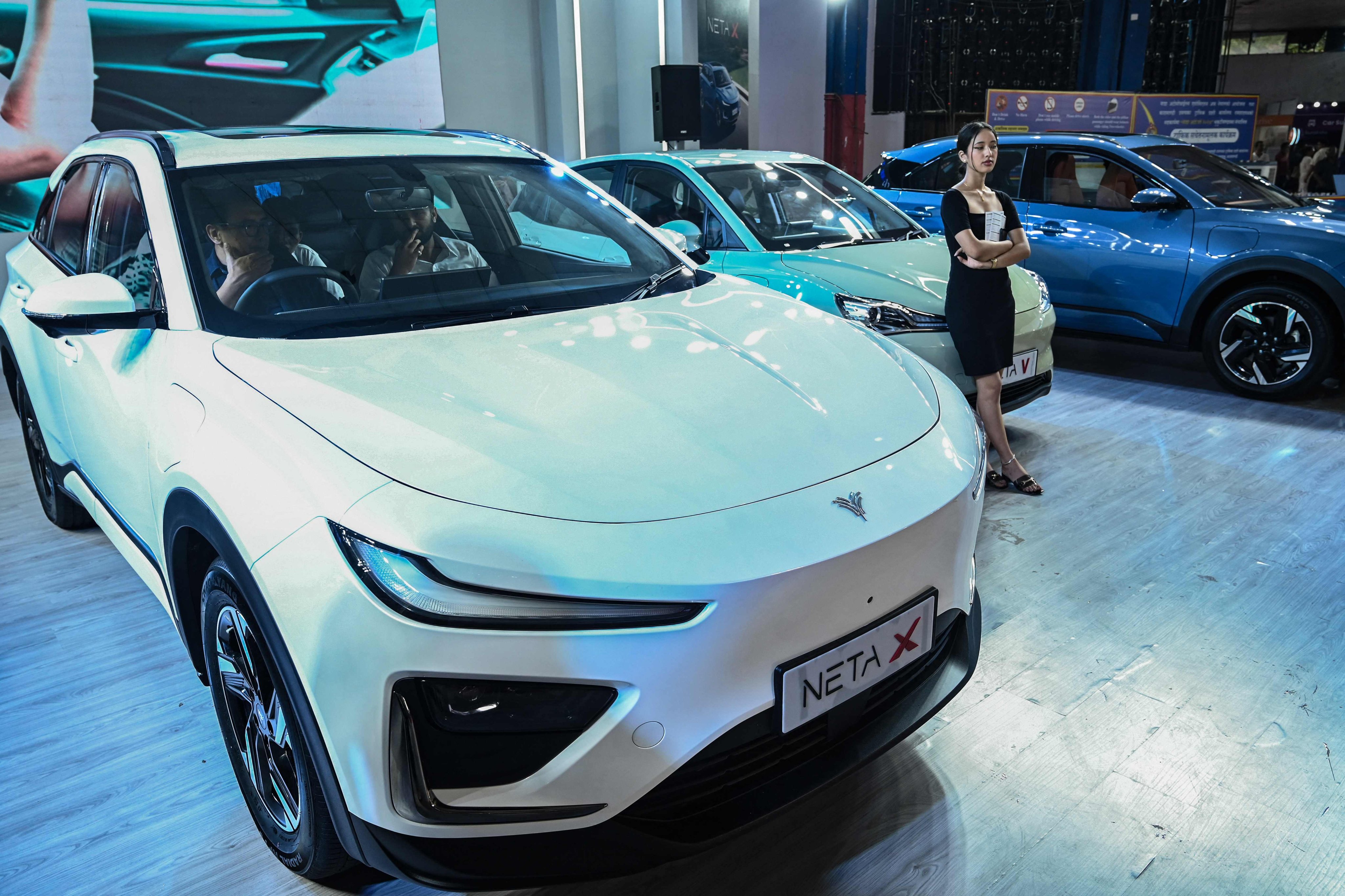 Visitors at an electric vehicle motor show in Kathmandu. Photo: AFP