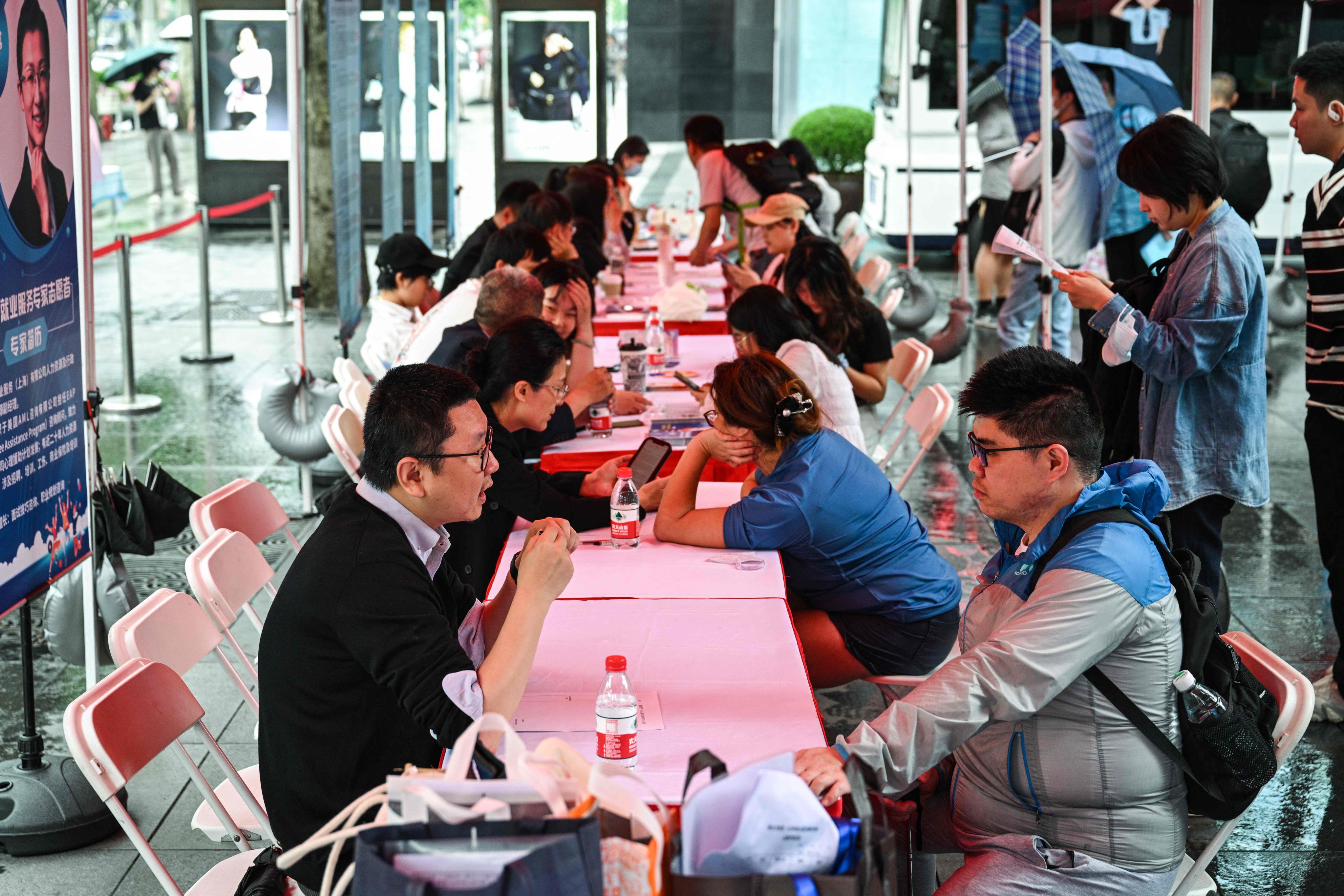 A job fair for soon-to-be graduates in central Shanghai in May: Photo: AFP