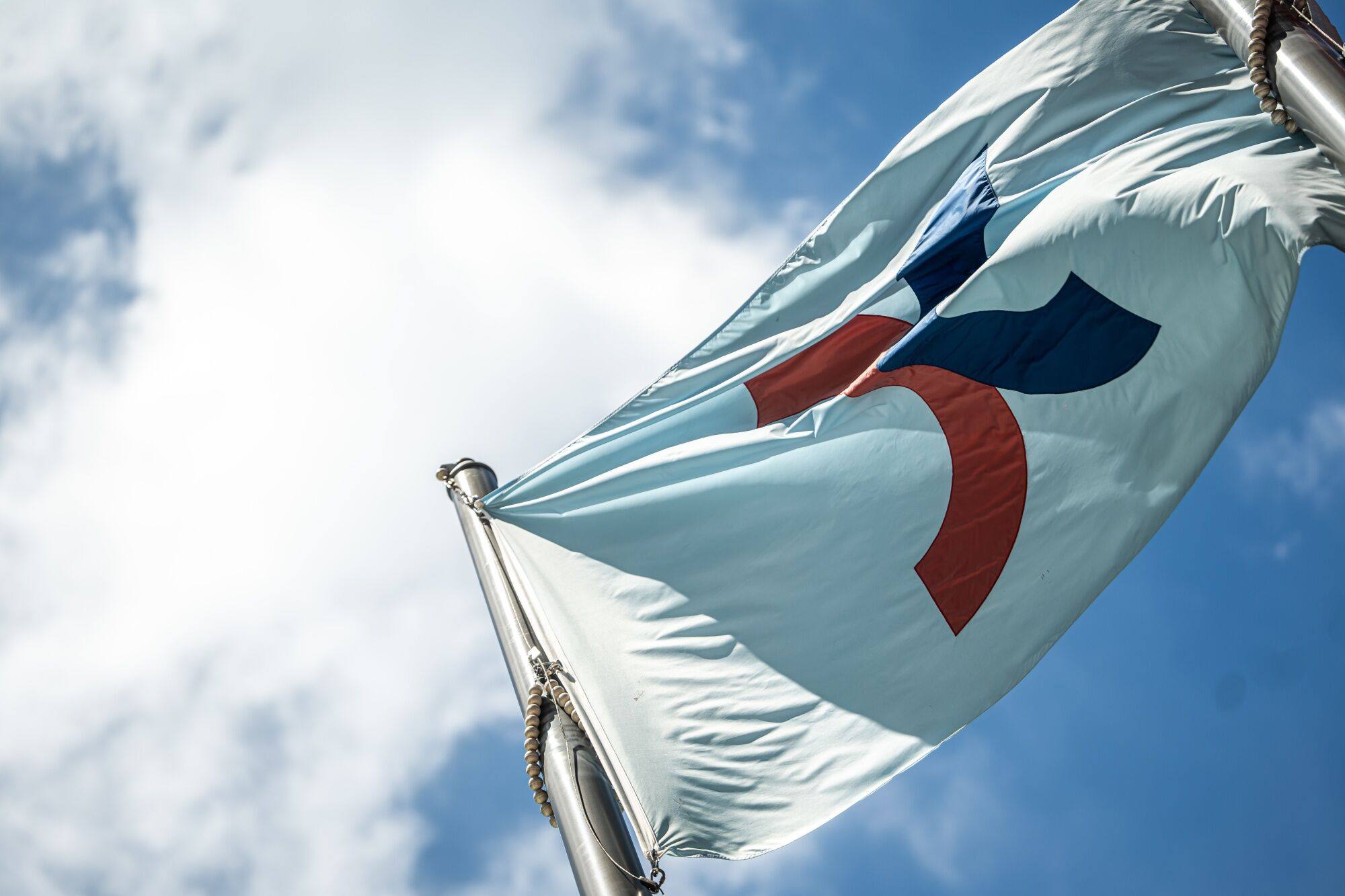 The flag for Hong Kong Exchanges and Clearing flies in Hong Kong. The city’s stock market has been on a tear in the past few days. Photo: Bloomberg