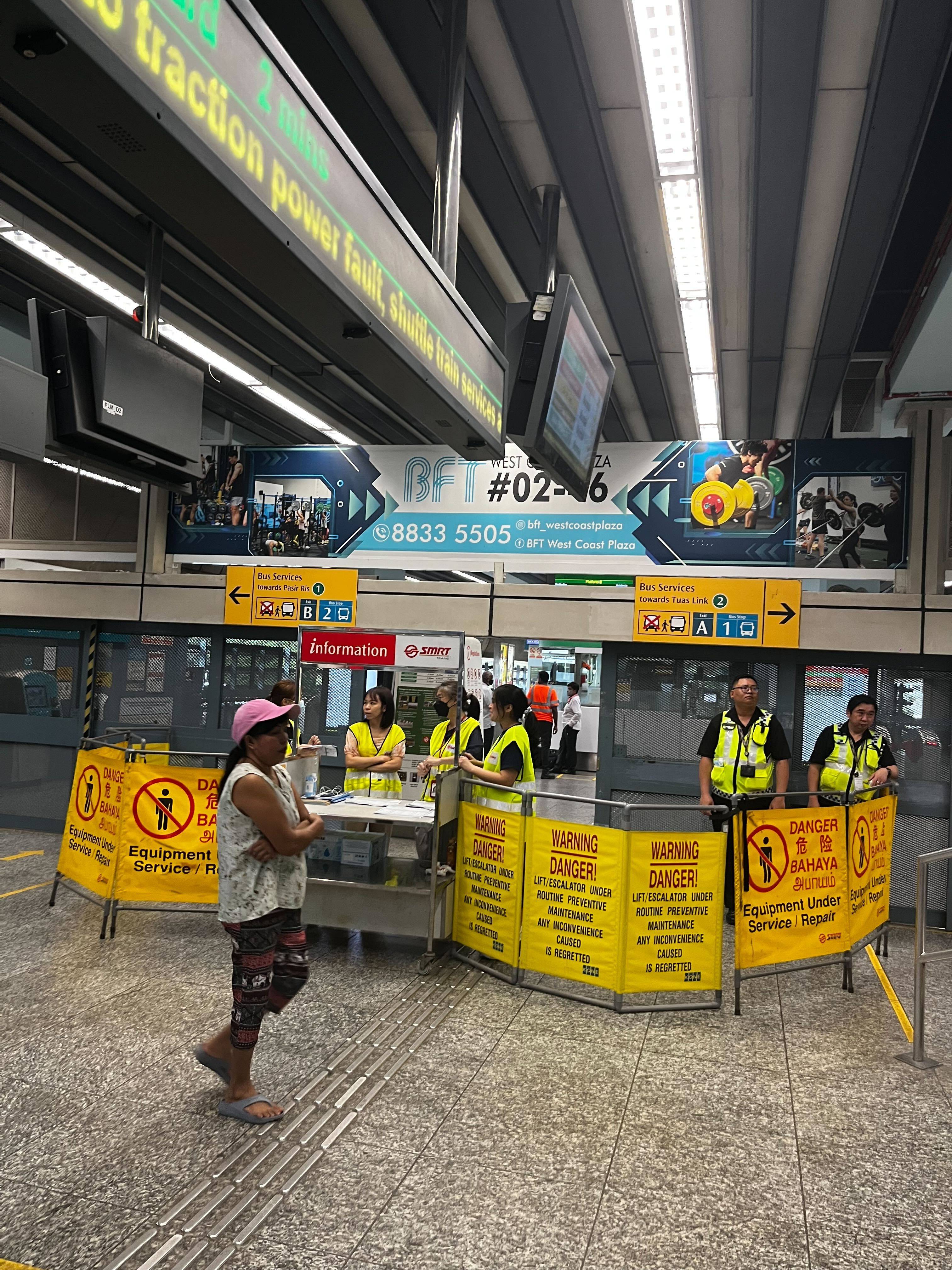 A barrier is placed at Clementi MRT station in Singapore following a major railway disruption. Photo: Jean Iau