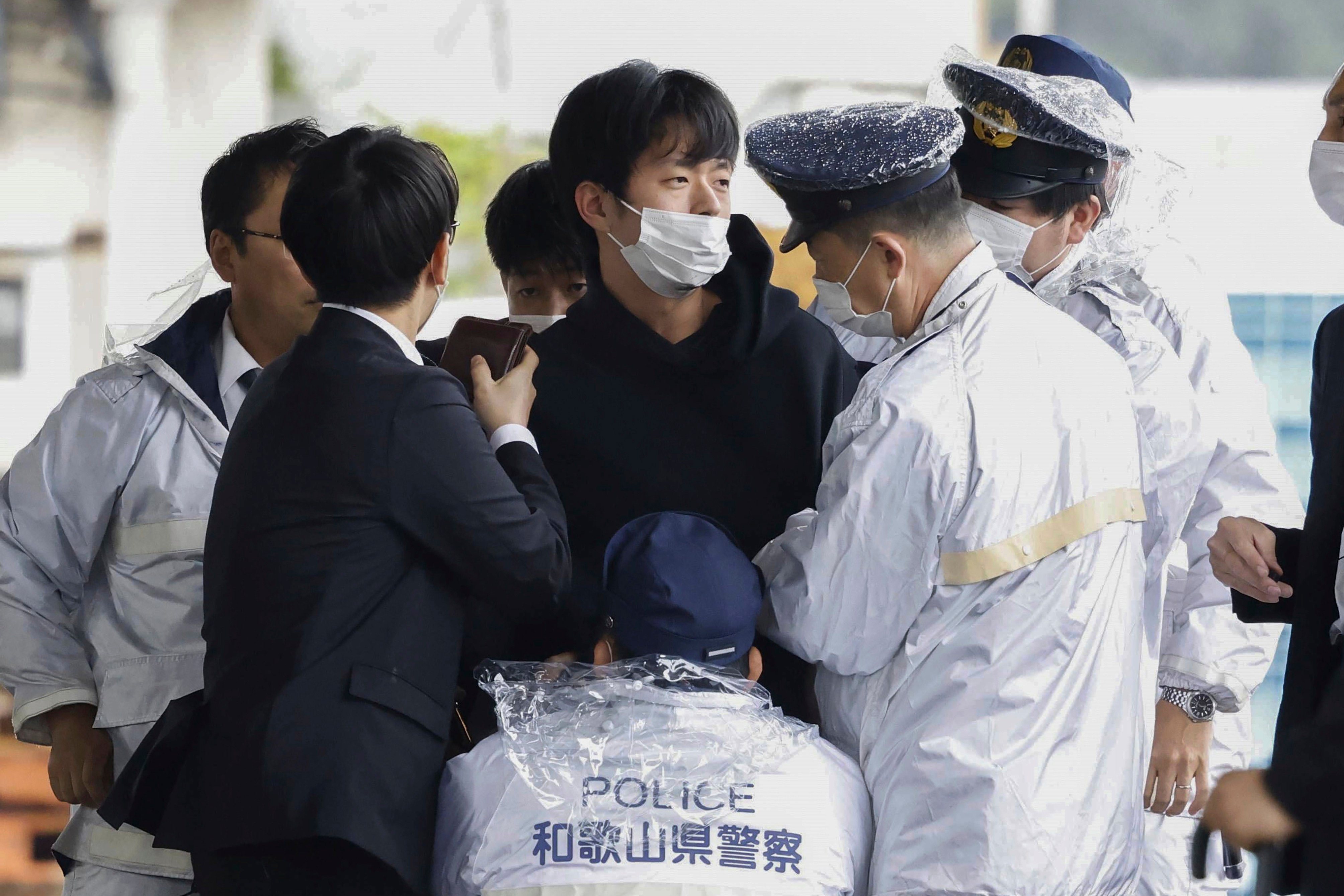 Ryuji Kimura is arrested after what appeared to be a pipe bomb was thrown at Prime Minister Fumio Kishida in Wakayama, western Japan, on April 15 last year. Photo: Kyodo News via AP