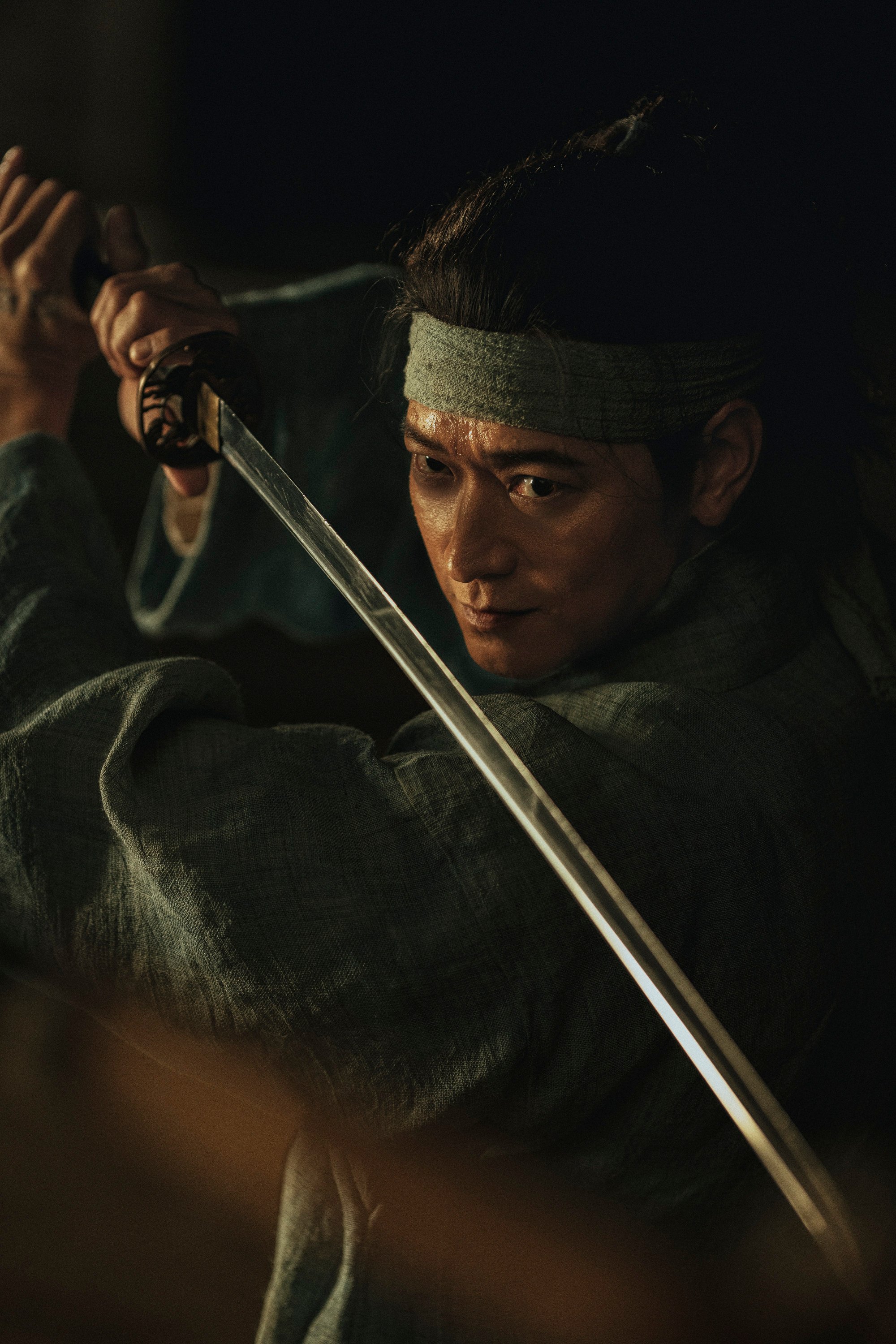 Gang Dong-won as Cheon-yeong in a still from Uprising. Photo: Lee Jae-hyuk/Netflix