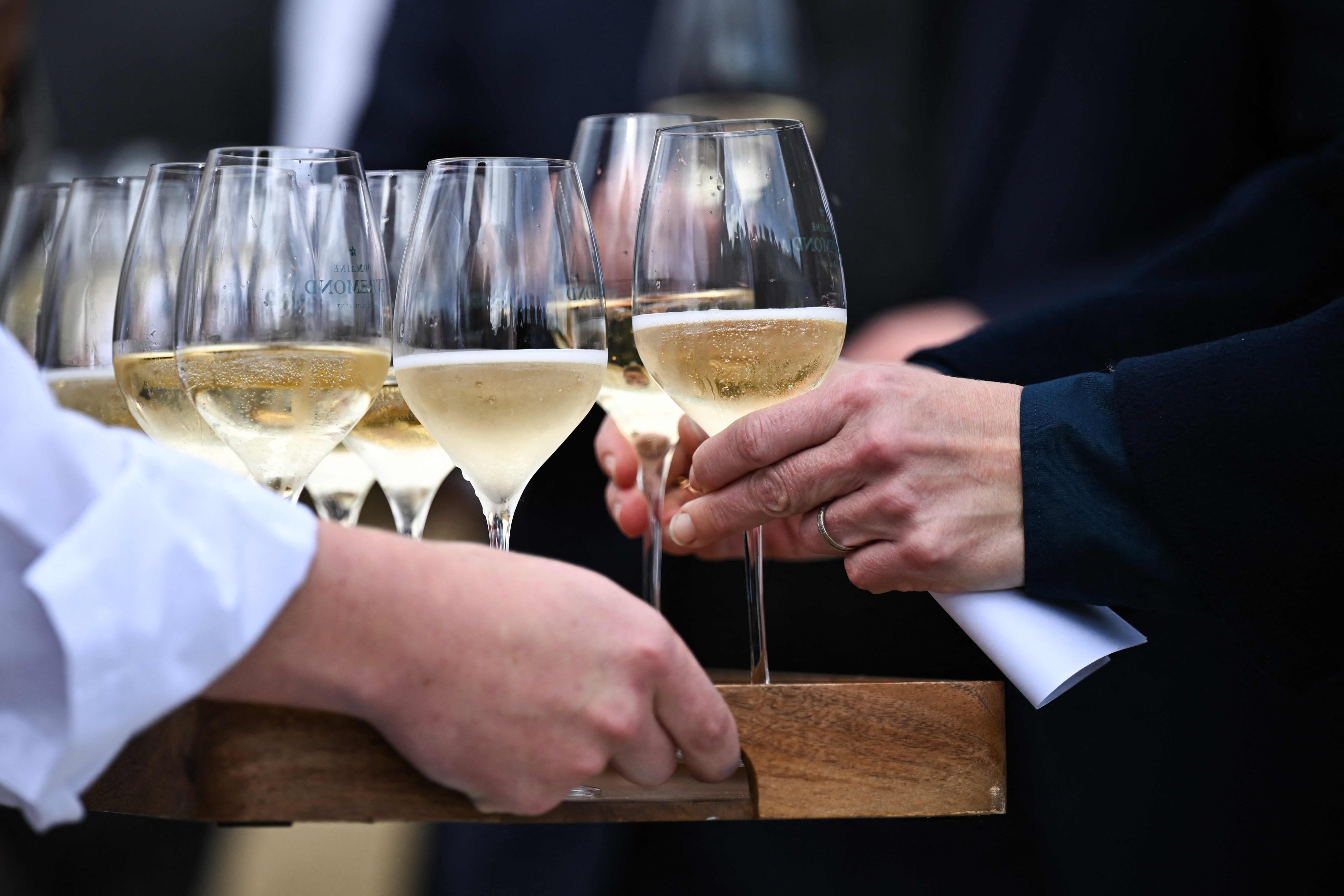 Wine is handed out at Domaine Evremond, French champagne house Taittinger’s new vineyard in Kent, in the UK. Photo: AFP