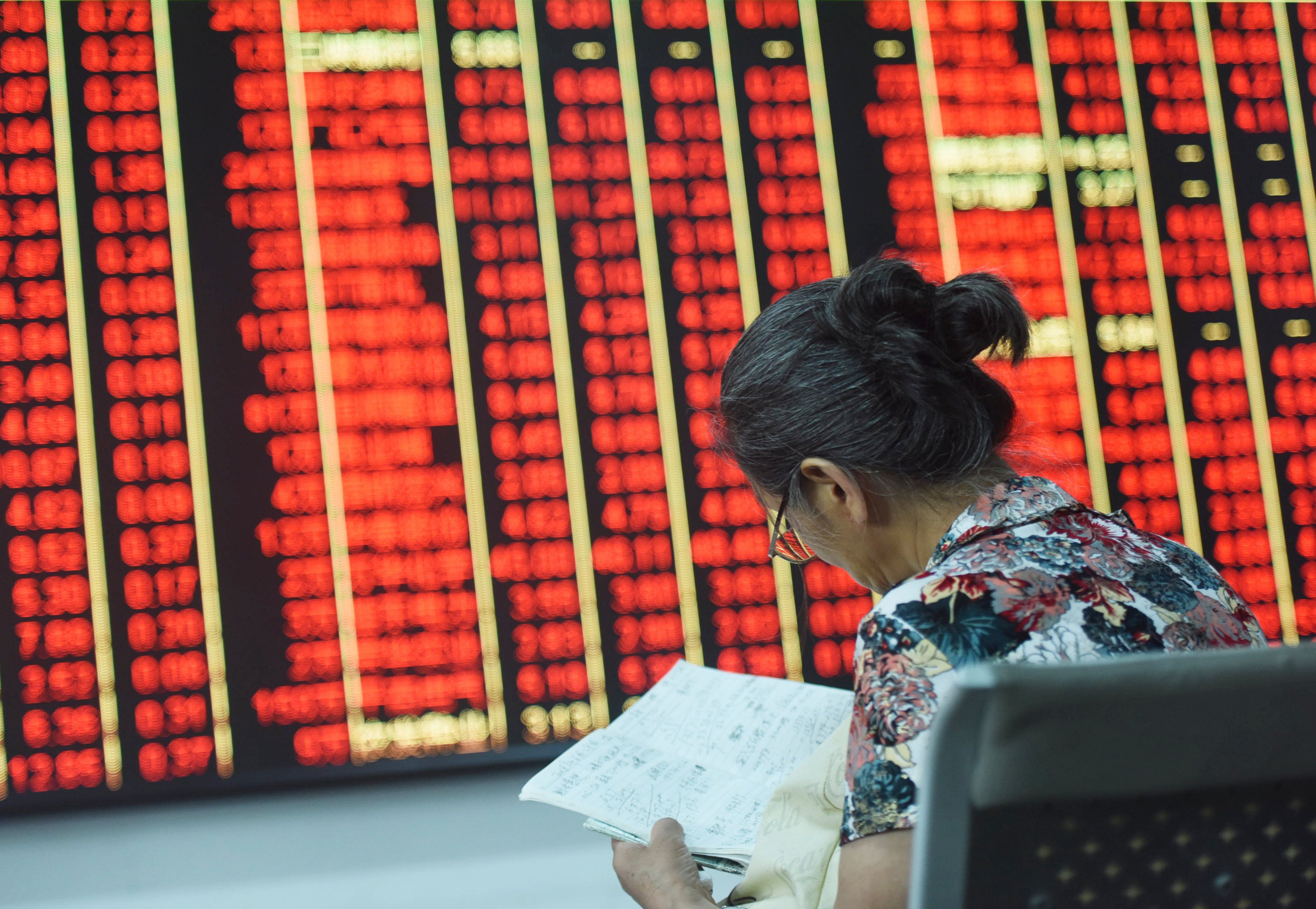 An investor studies the market in Hangzhou, capital of East China’s Zhejiang Province, Sept 24, 2024. Photo: CFOTO/Future Publishing via Getty Images