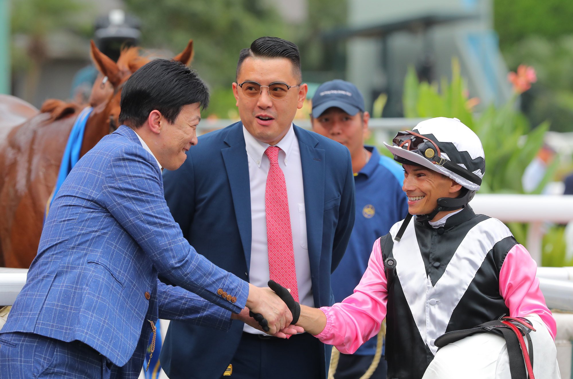 Pierre Ng (centre) and Alexis Badel (right) celebrate Beauty Waves’ Sha Tin triumph.