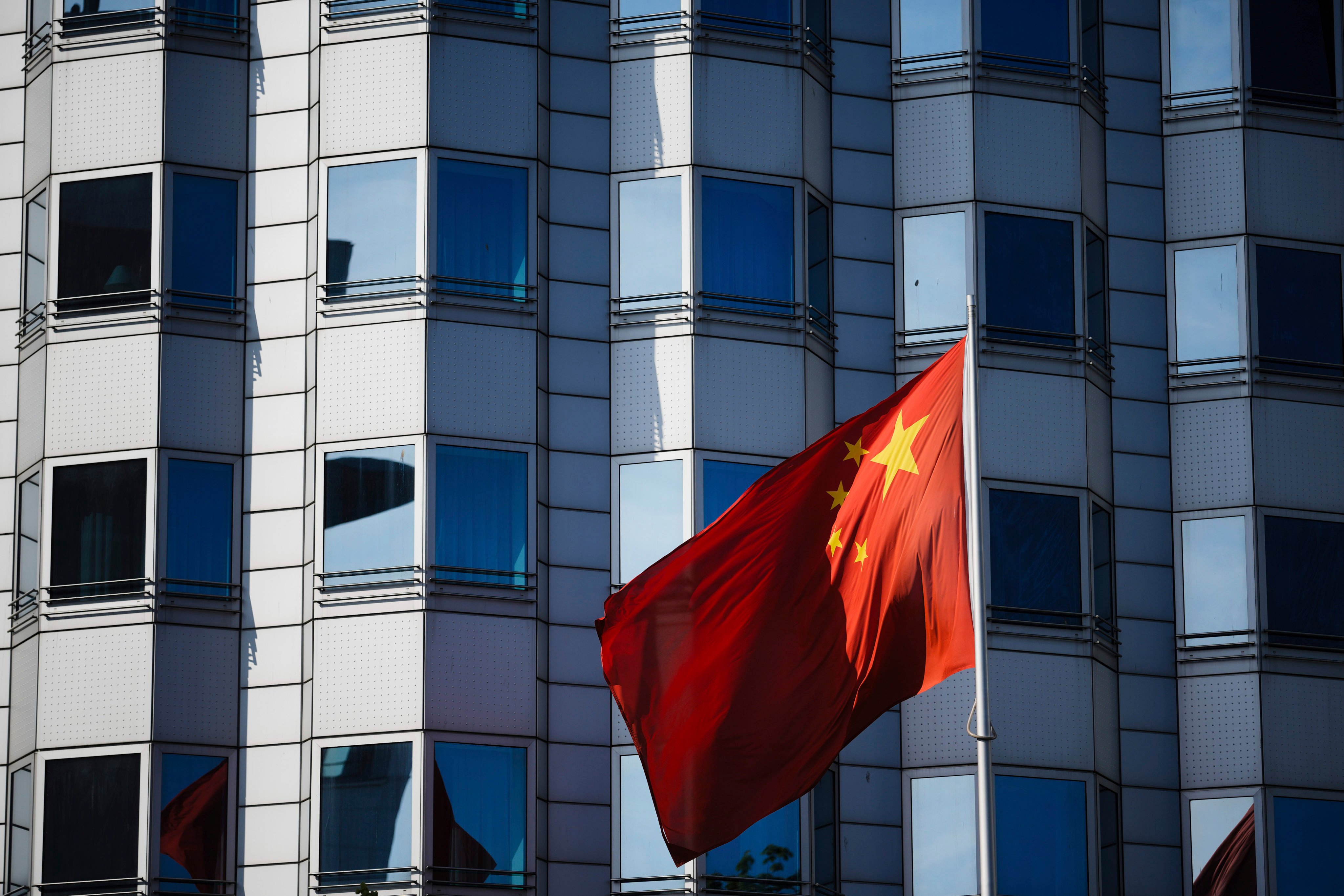 The Chinese national flag waves in front of the country’s embassy in Berlin. Photo: AP