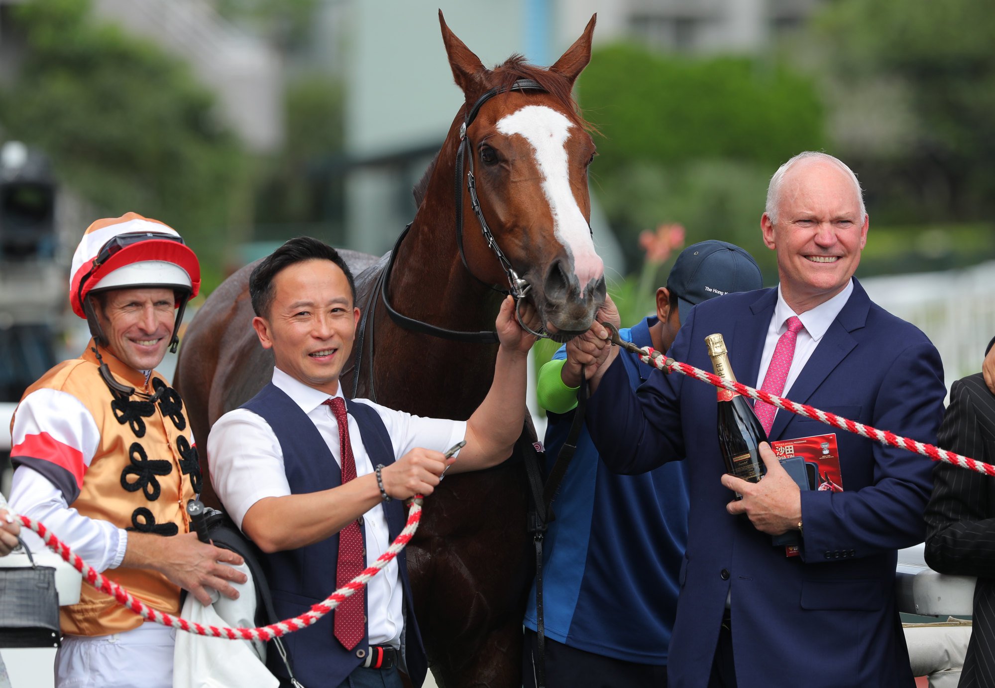 Jockey Hugh Bowman and trainer David Hall (right) celebrate Geneva’s win.