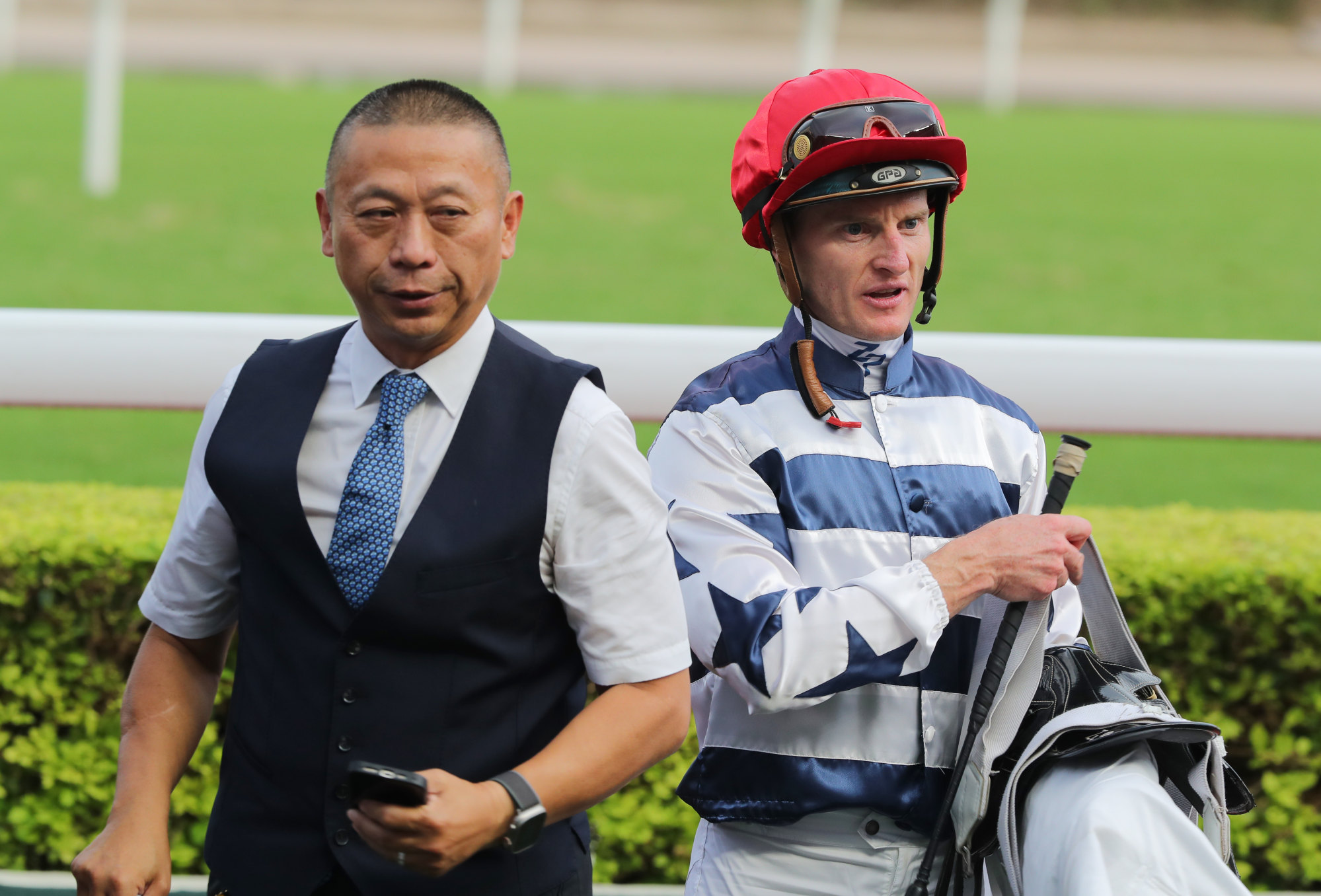 Trainer Danny Shum and jockey Zac Purton after Packing Power’s third win from as many starts.