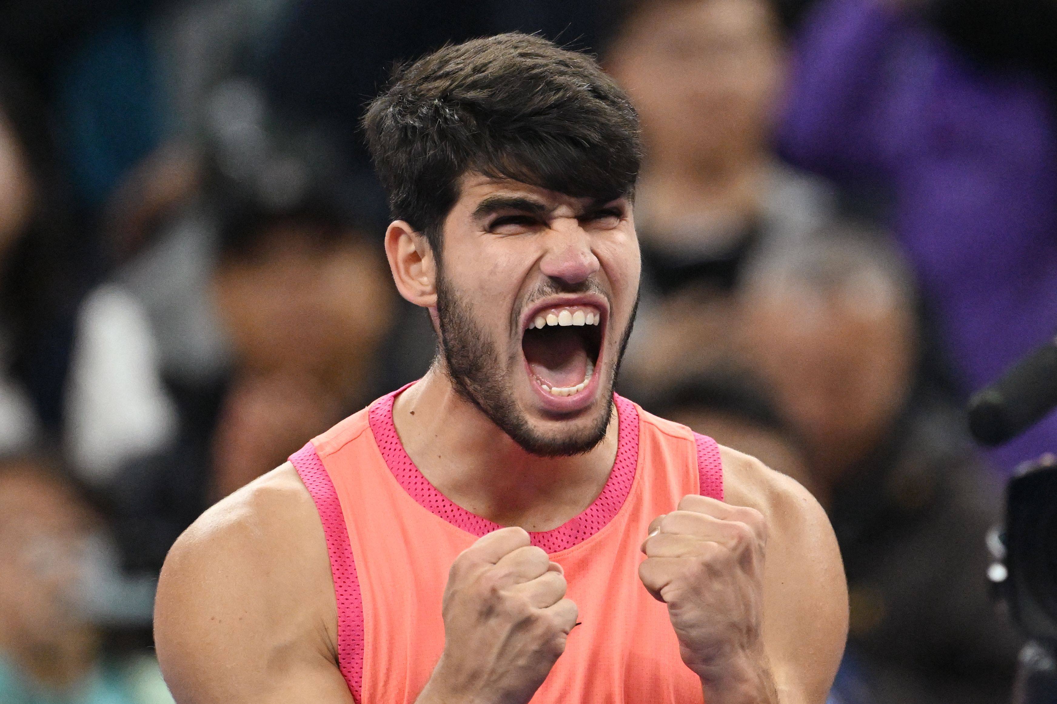 Carlos Alcaraz celebrates after defeating Jannik Sinner in the China Open final in Beijing. Photo: AFP