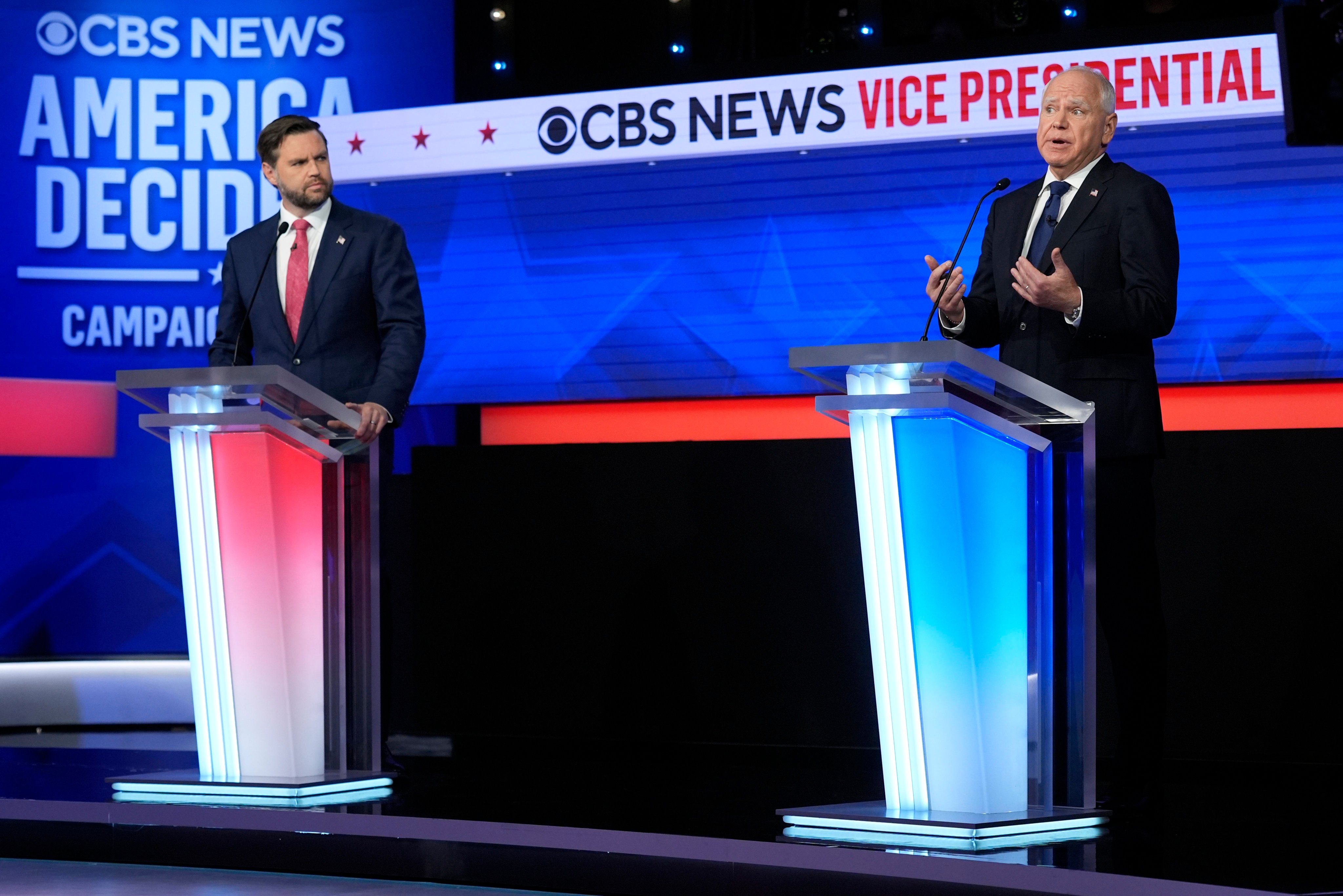 Republican vice-presidential nominee US Senator J.D. Vance (left) and Democratic vice-presidential nominee Minnesota Governor Tim Walz speak on stage at the debate in New York. Photo: AP