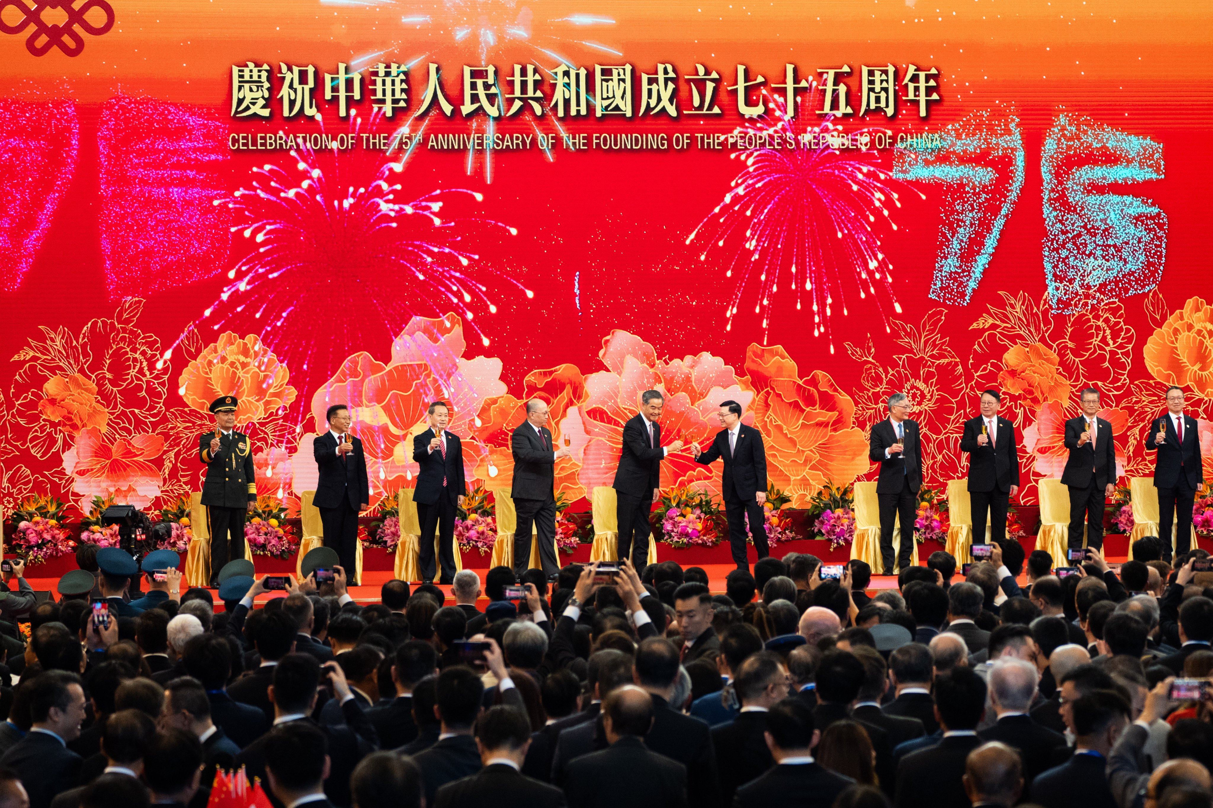 Hong Kong Chief Executive John Lee and former Chief Executive Leung Chun-ying (both centre) make a toast during a reception marking China’s National Day at the Hong Kong Convention and Exhibition Centre on October 1. Photo: EPA-EFE