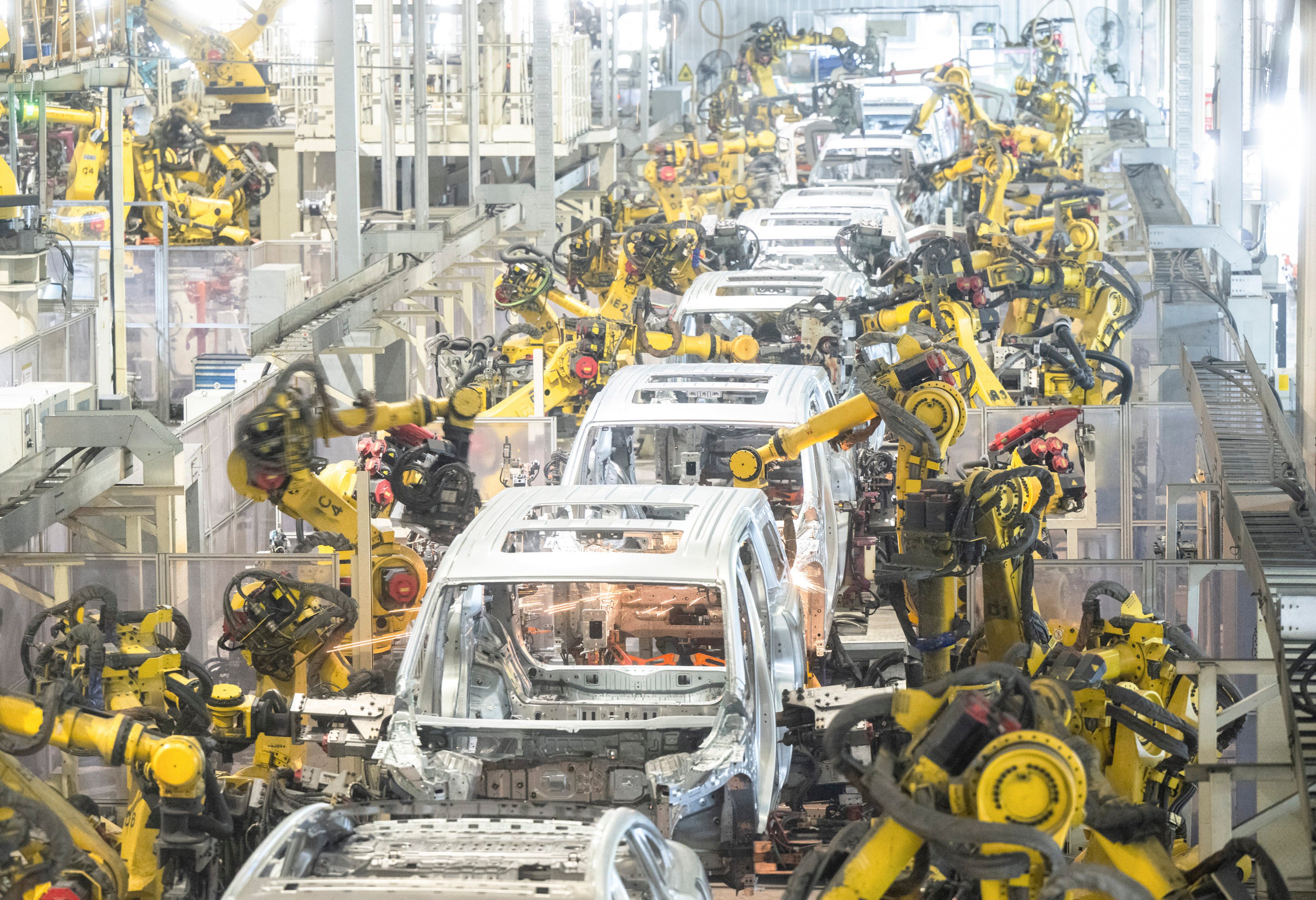 Robots perform welding work on vehicles for Voyah, a division of Chinese state-owned carmaker Dongfeng Motor Corporation, in Wuhan, Hubei province, in April. Photo: Xinhua