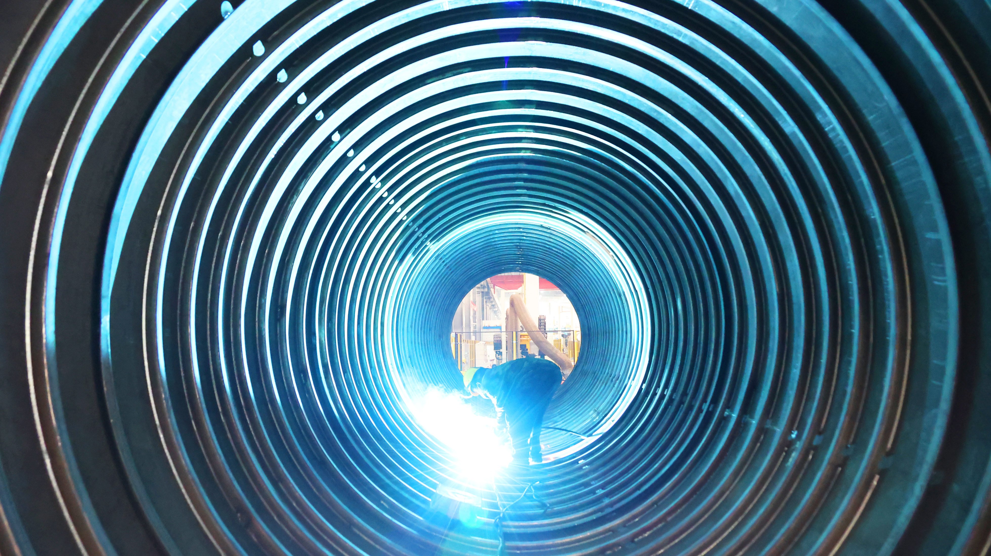 A welder works on an LNG tank container at a company producing shipping equipment in Lianyungang, in Jiangsu province, on March 15, 2023. Photo: Xinhua