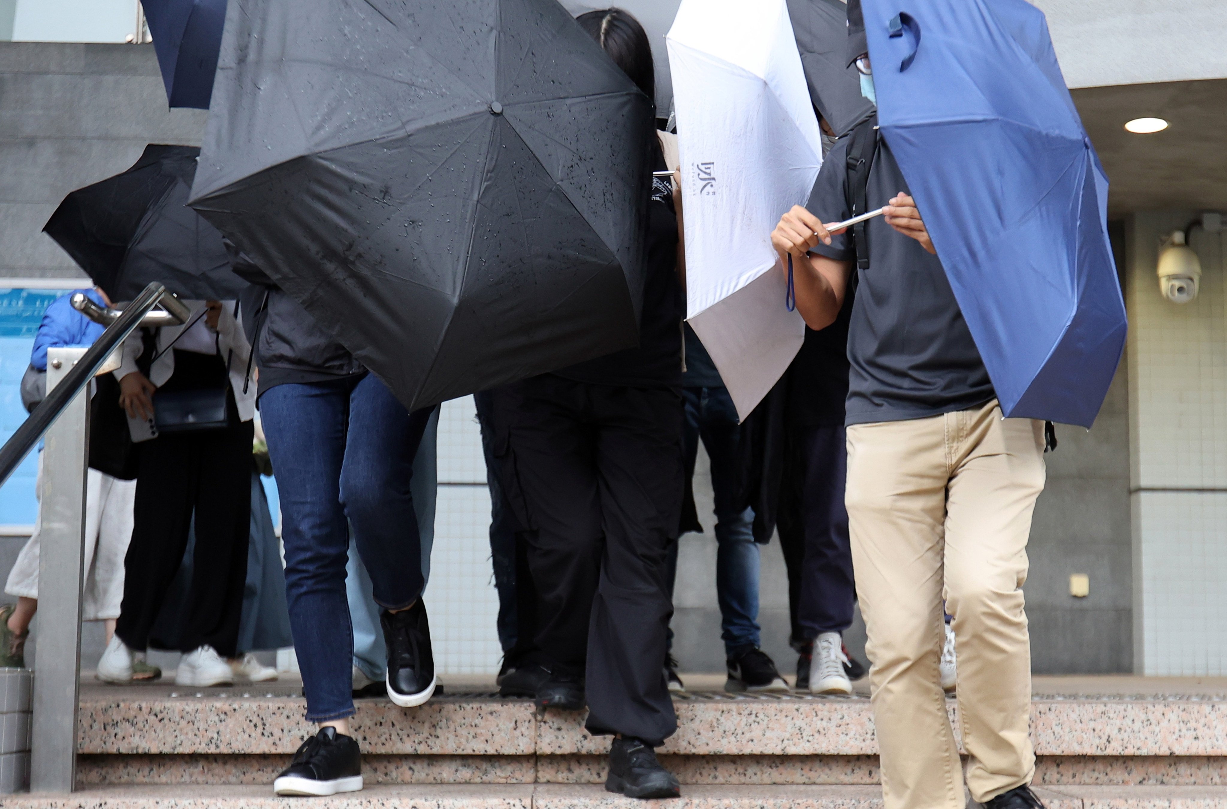 Chan Pak-yui (centre) has abandoned an appeal against his sentence. Photo: Edmond So