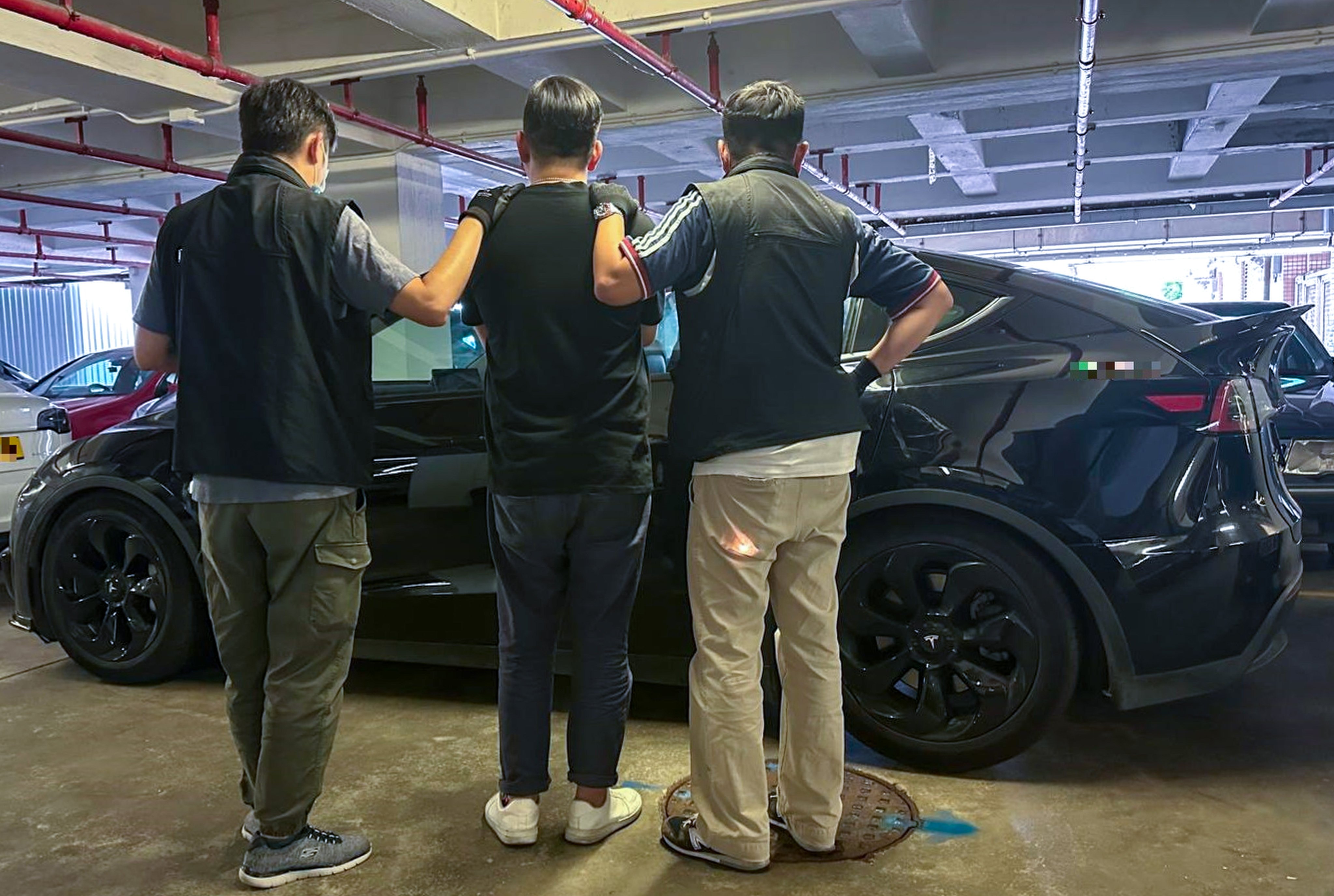 Hong Kong police have arrested a chemist who allegedly lured a woman into his Tesla. Photo: Handout