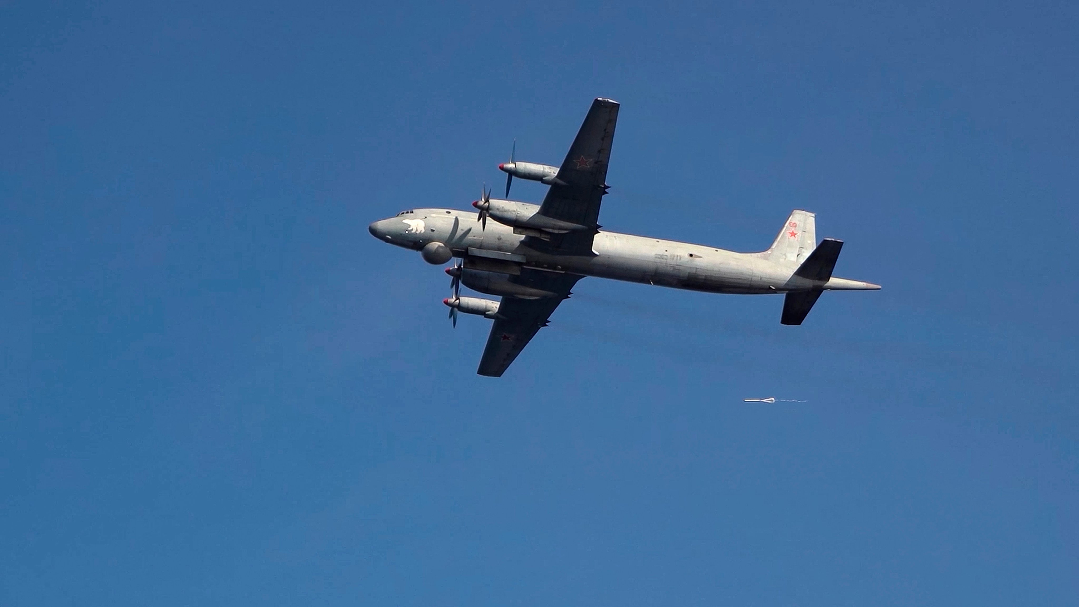 An IL-38 patrol plane of the Russian navy flies over the Barents Sea on September 11. Photo: Russian Defense Ministry Press Service/AP