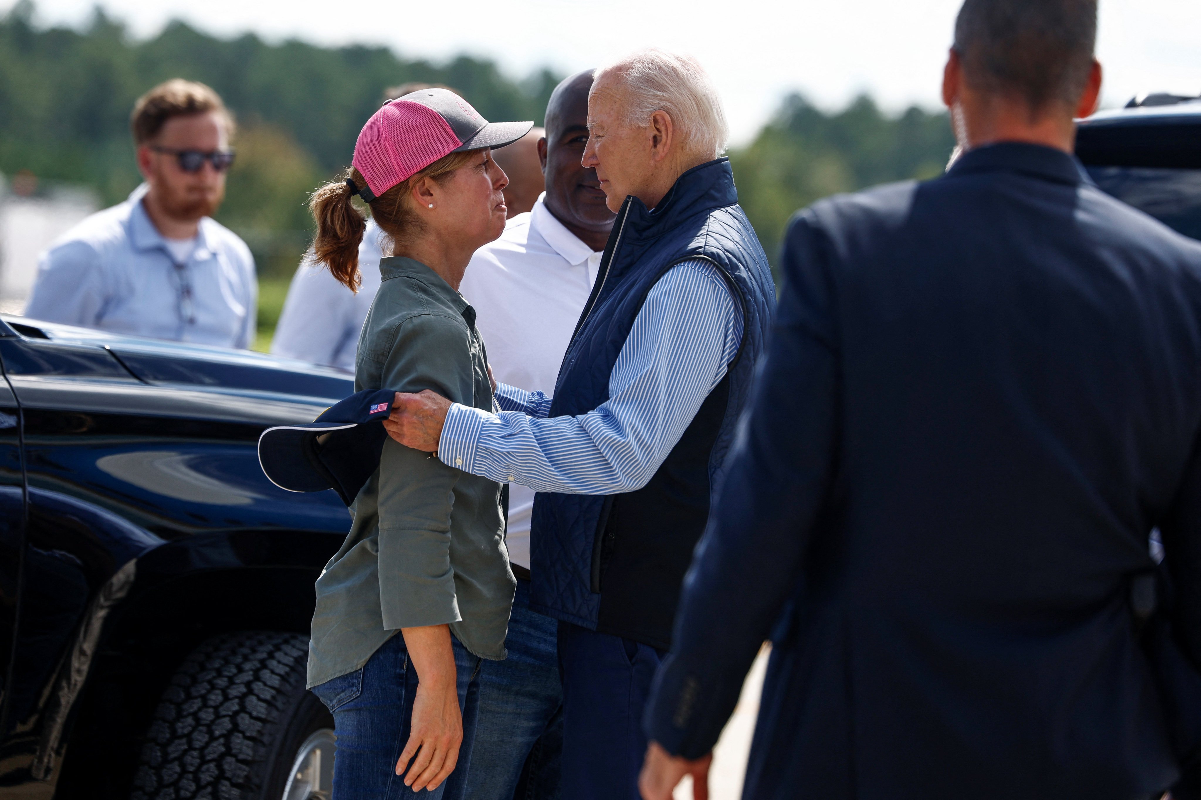 US President Joe Biden embraces Esther Manheimer, mayor of Asheville, North Carolina, at Greenville-Spartanburg International Airport in Greer, South Carolina, on Wednesday. Photo: Reuters