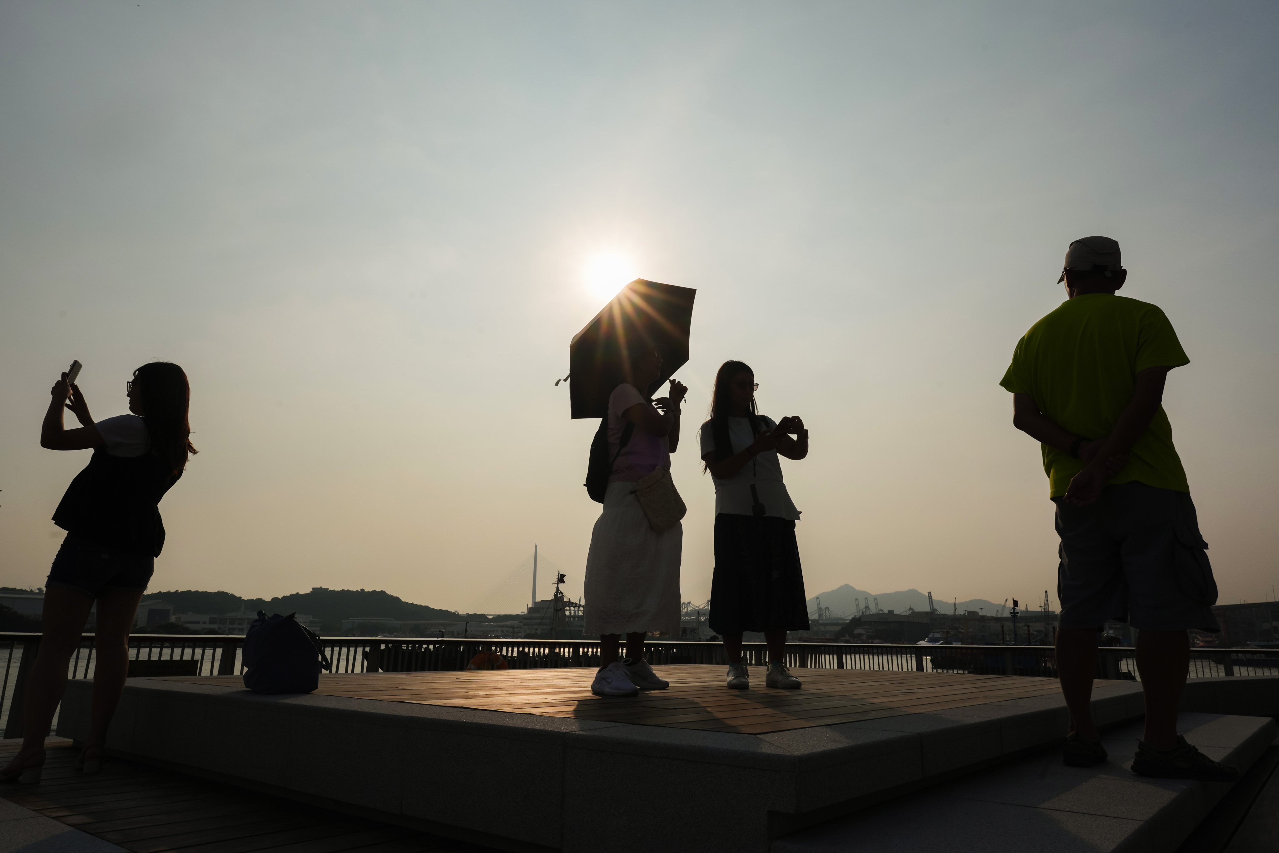 People in Cheung Sha Wan take in the view of Victoria Harbour. The Observatory says September 2024 in Hong Kong was the “third hottest” in recorded history. Photo: Eugene Lee