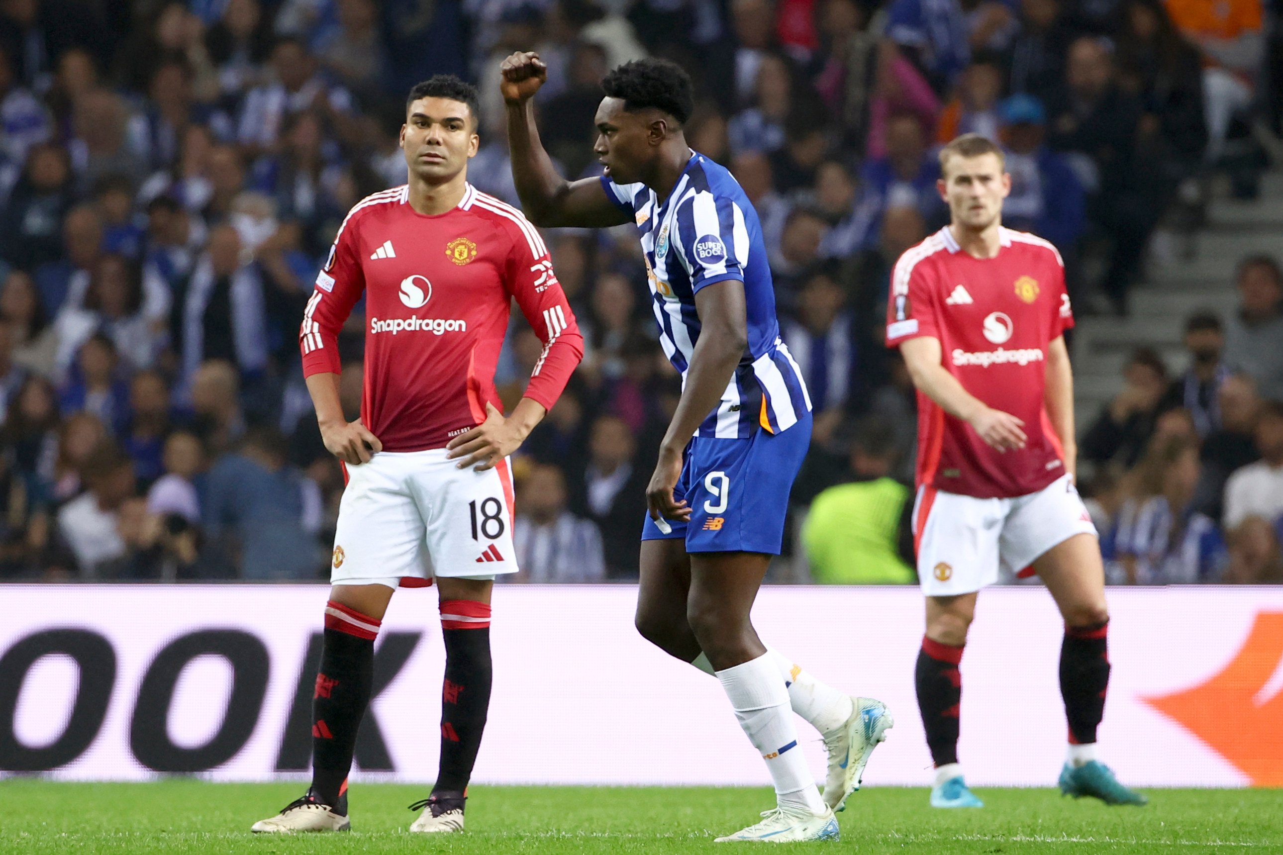 Porto’s Samu Omorodion celebrates scoring his side’s third goal against Manchester United. Photo: AP