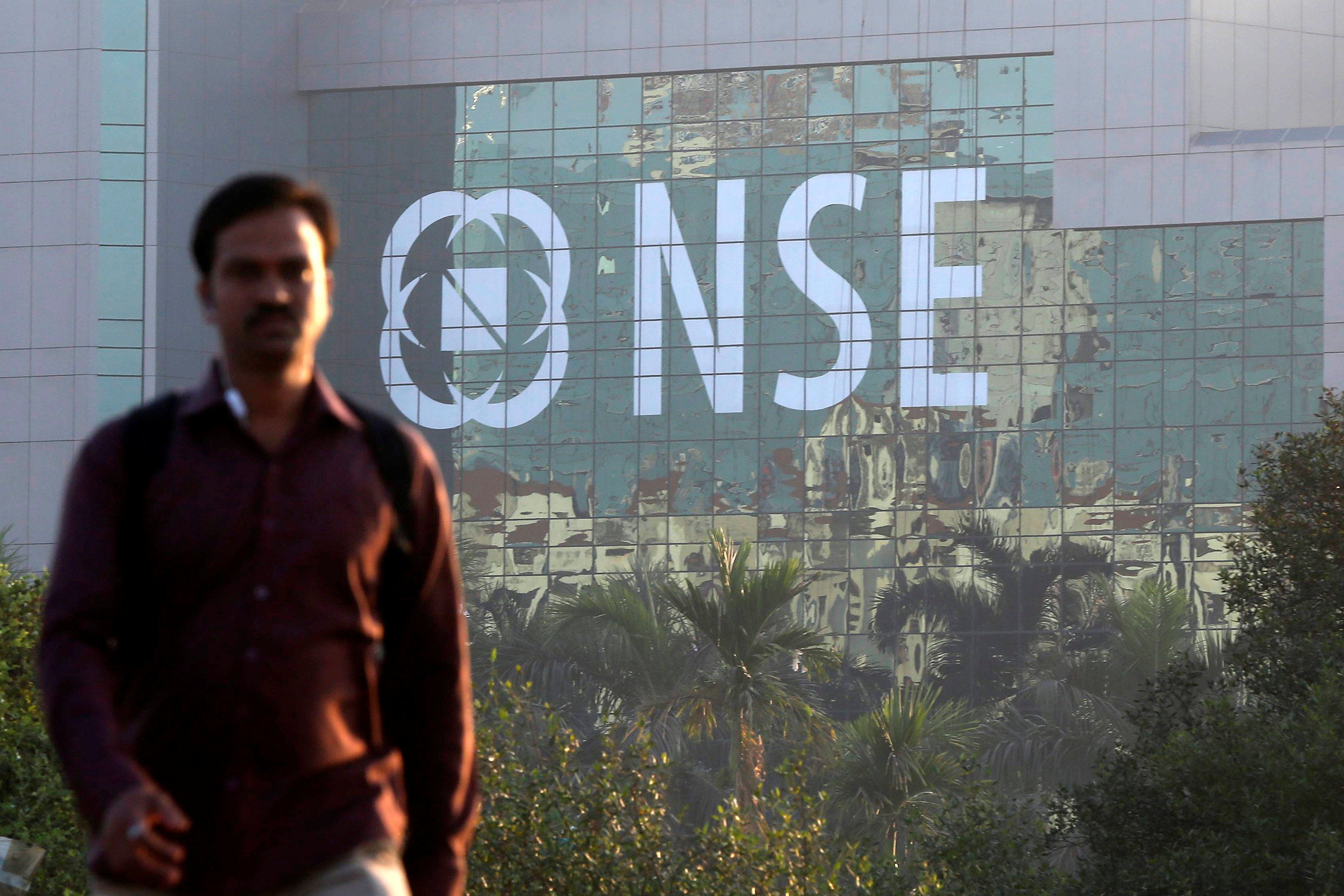 A man walks past the National Stock Exchange building in Mumbai, India. Photo: Reuters