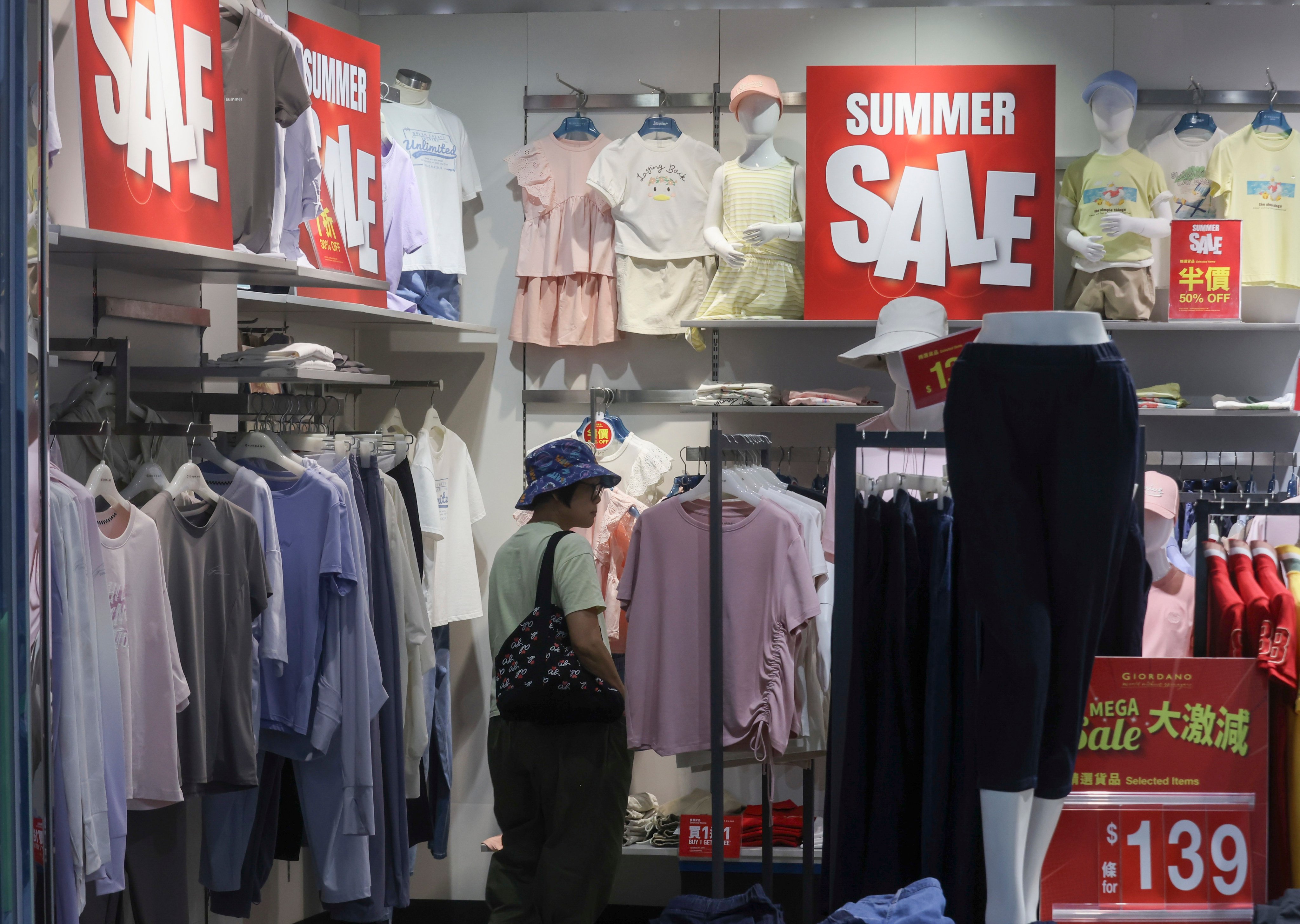 A shopper looks at clothes at a shopping mall in Hong Kong’s Yau Tong district, on August 30. Photo: Jonathan Wong