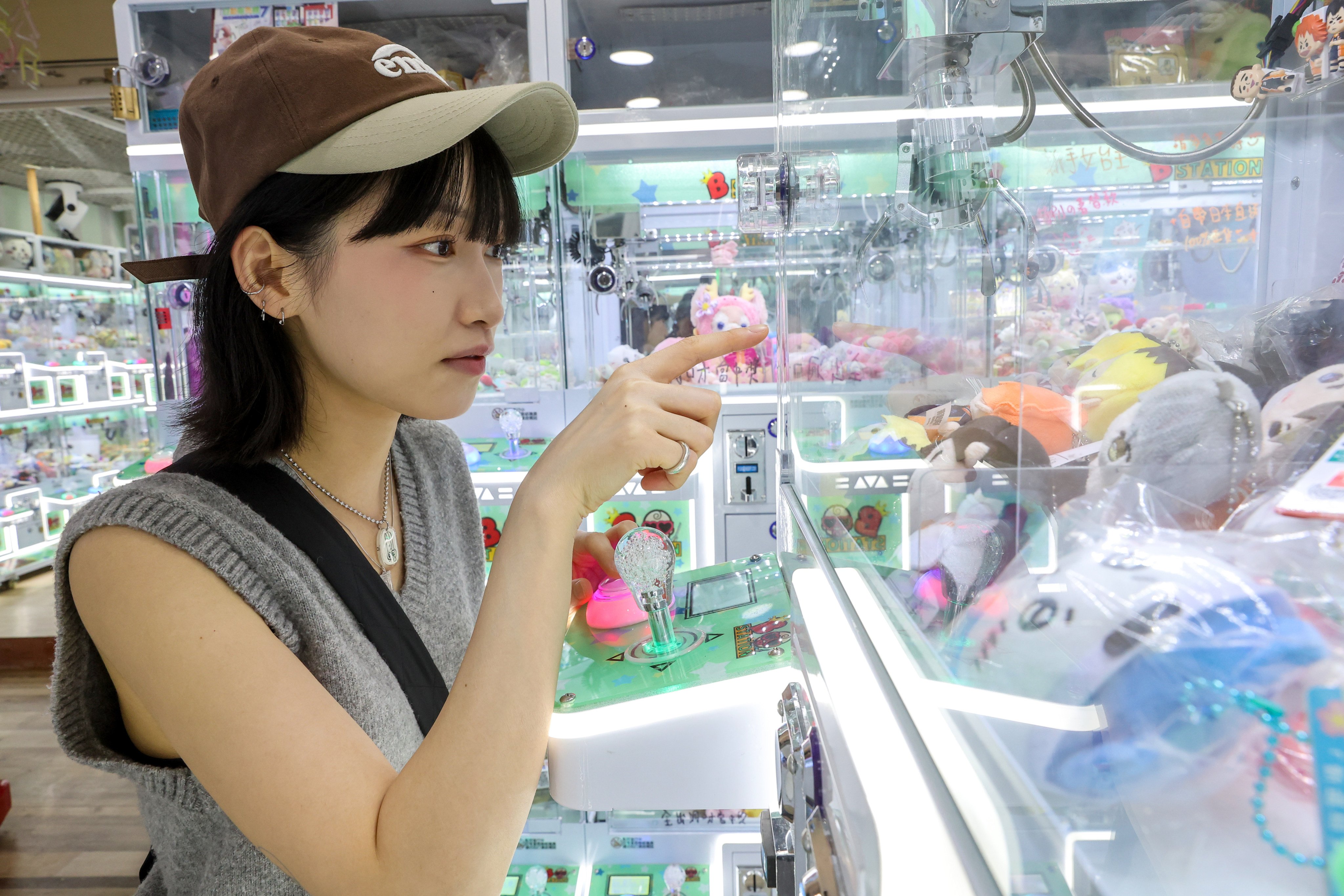 A woman who gave her first name as Kelsey says she and her boyfriend visit claw machine arcades, like this one at Dragon Centre in Sham Shui Po, twice a week. Edmond So