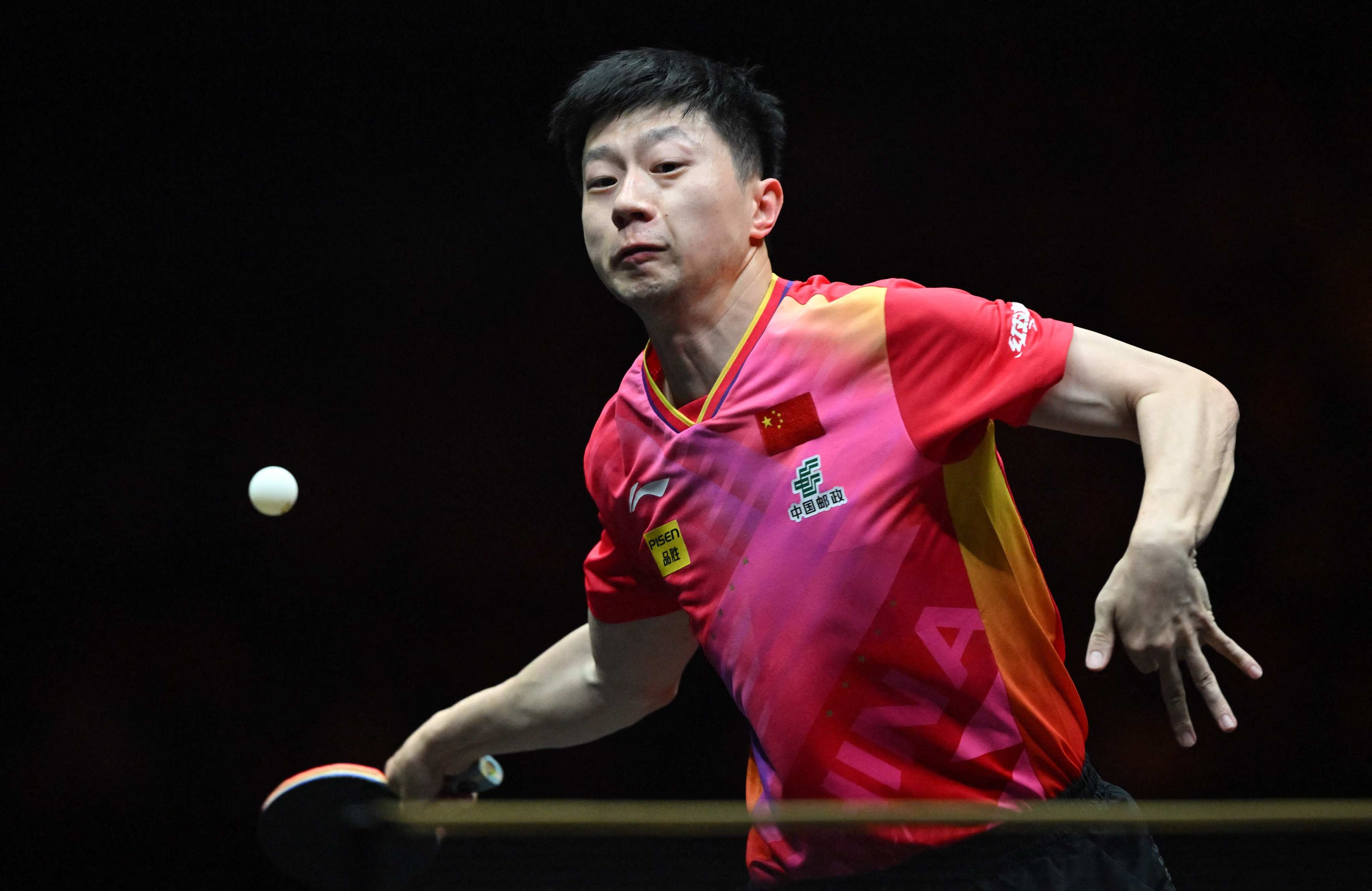 China’s Ma Long hits a return to Brazil’s Hugo Calderano during their singles quarter-final that Ma said went “more smoothly than I thought”. Photo: AFP