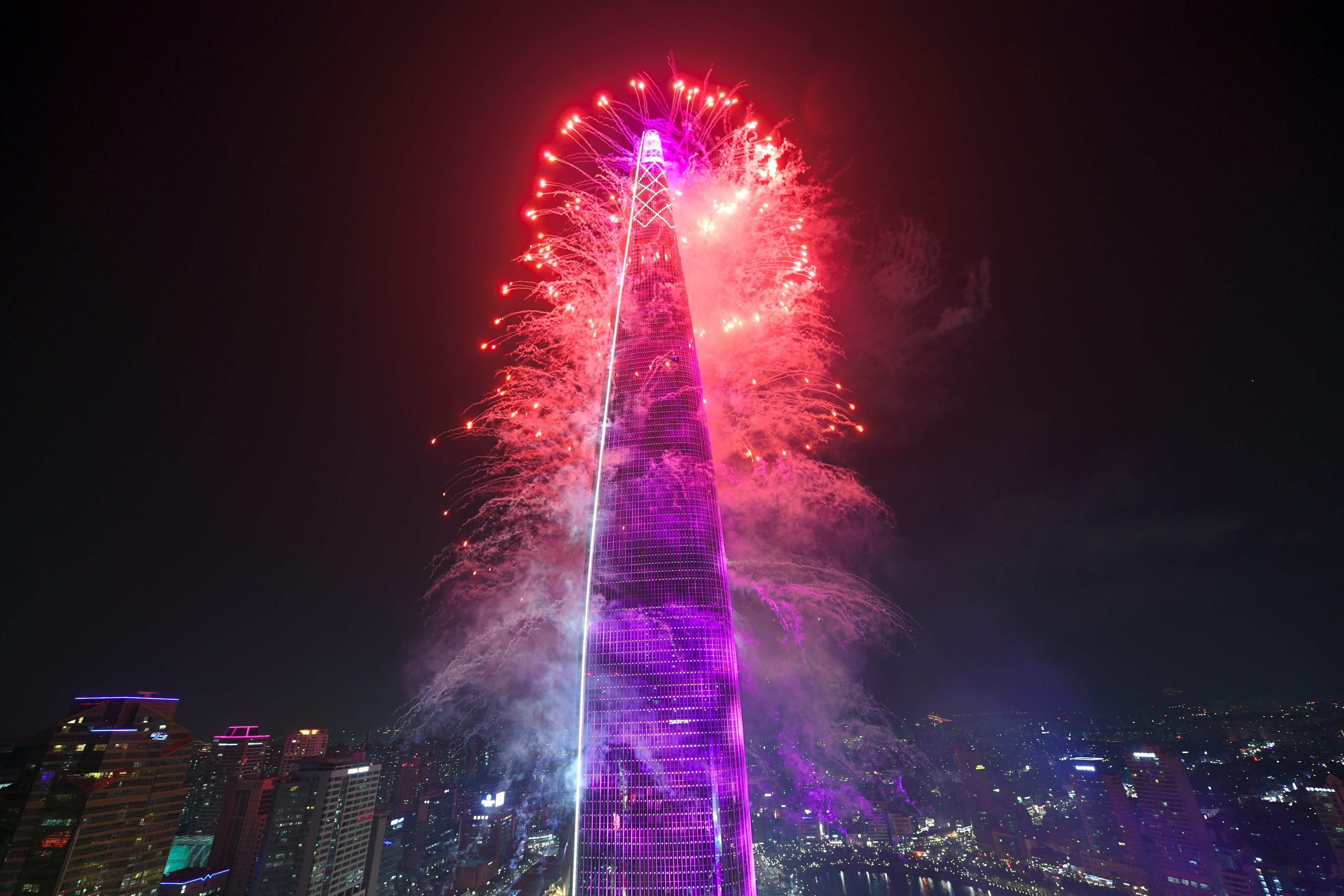 This file photo shows fireworks on the Lotte World Tower to celebrate its opening in Seoul on April 2, 2017. Photo: AFP