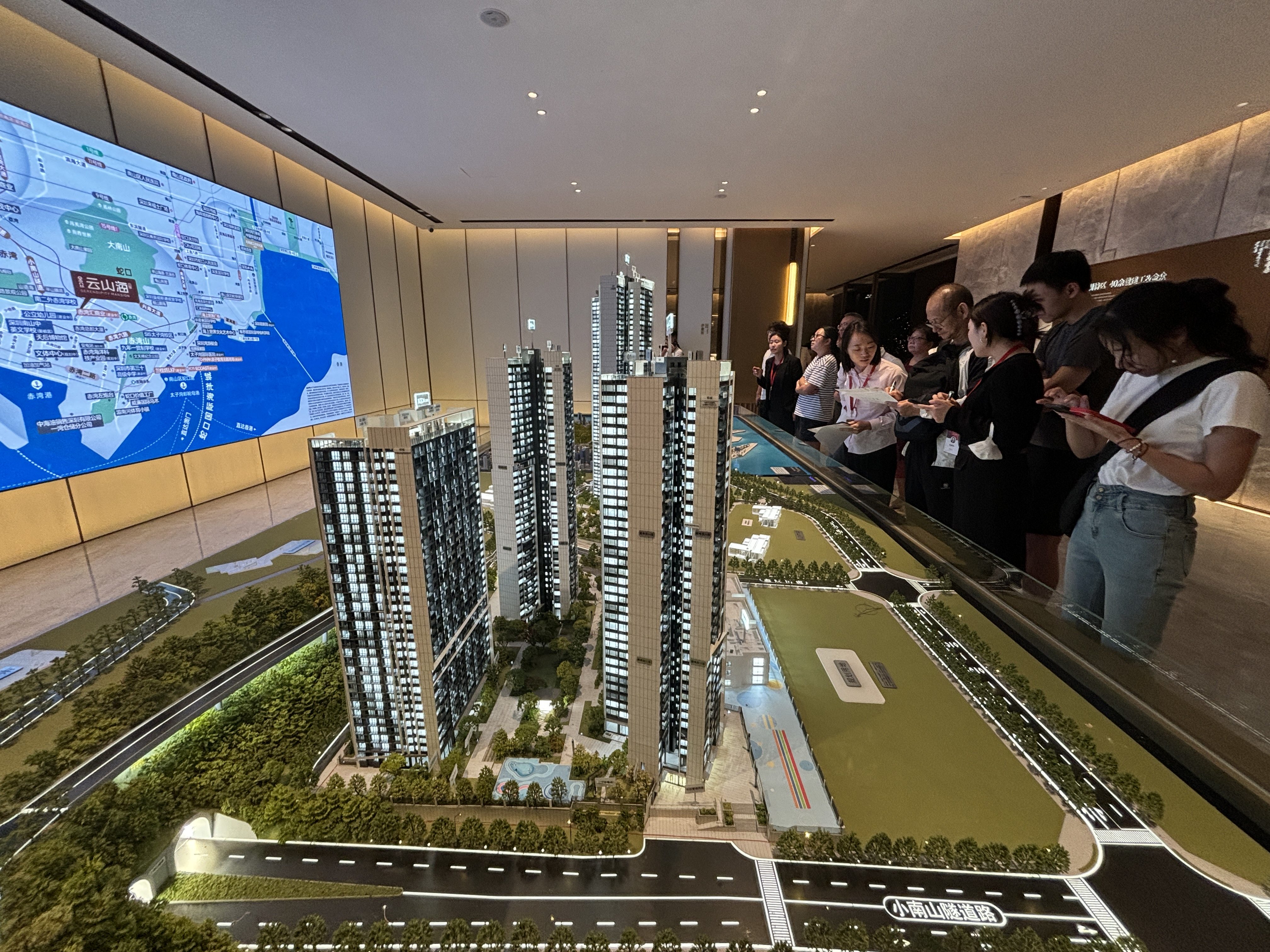 Chinese homebuyers gather at a property showroom in Shenzhen’s Nanshan district on October 3, 2024. Photo: Yulu Ao